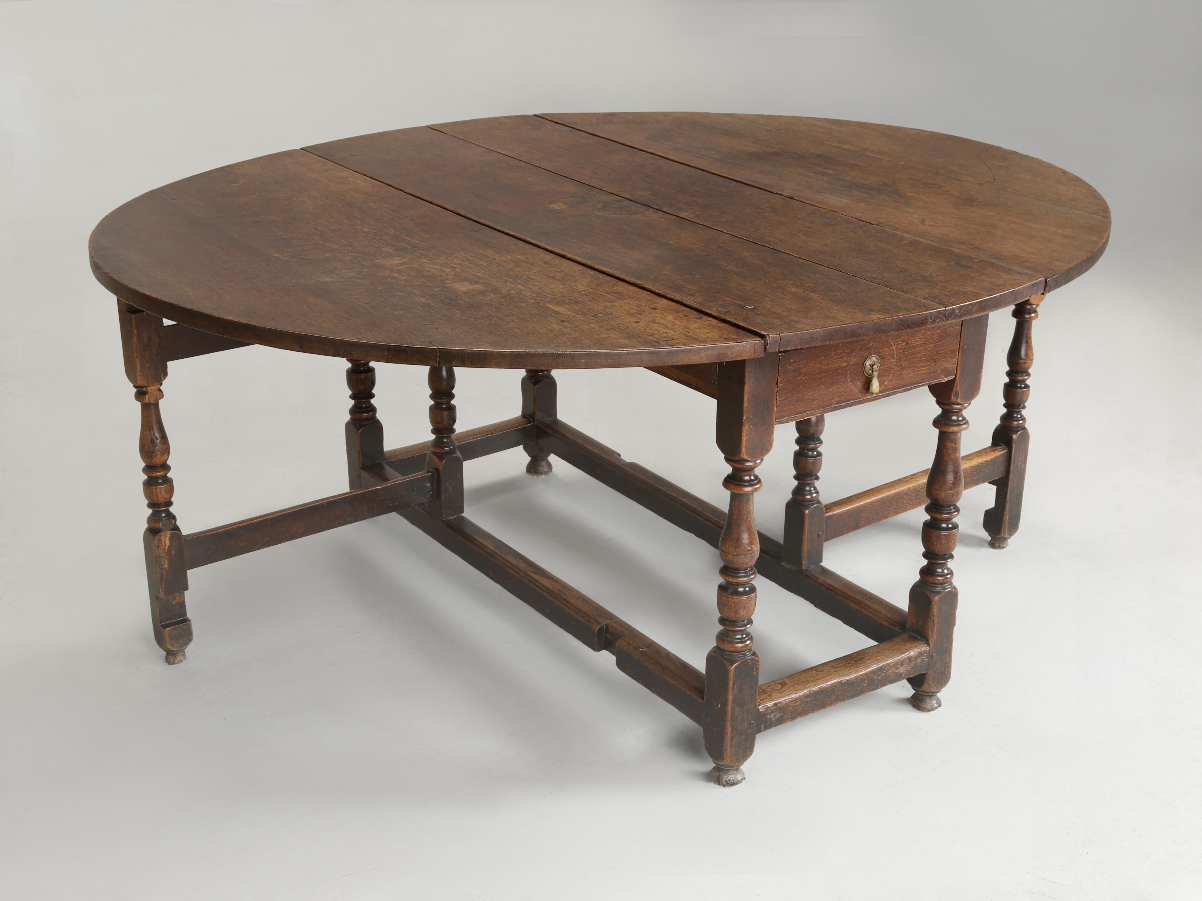 Country Antique English 250-Year Old Drop-Leaf Oak Dining Table with a Great Patina For Sale