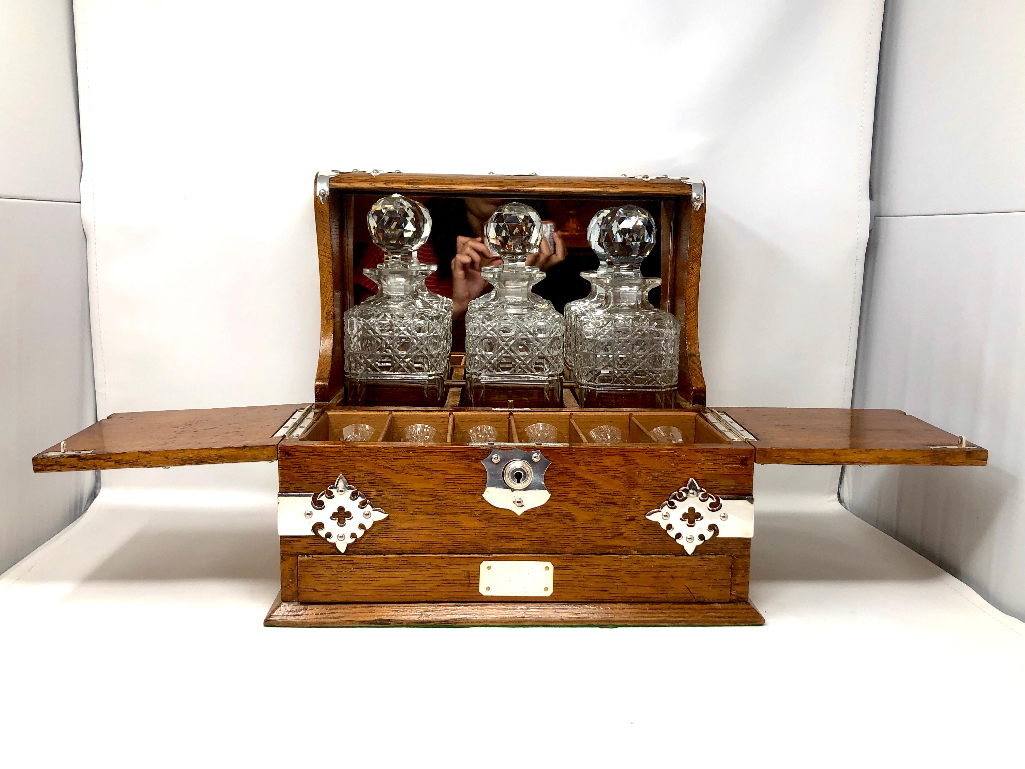 Antique English 3 bottle tantalus and games box compendium, Circa 1875-1885.