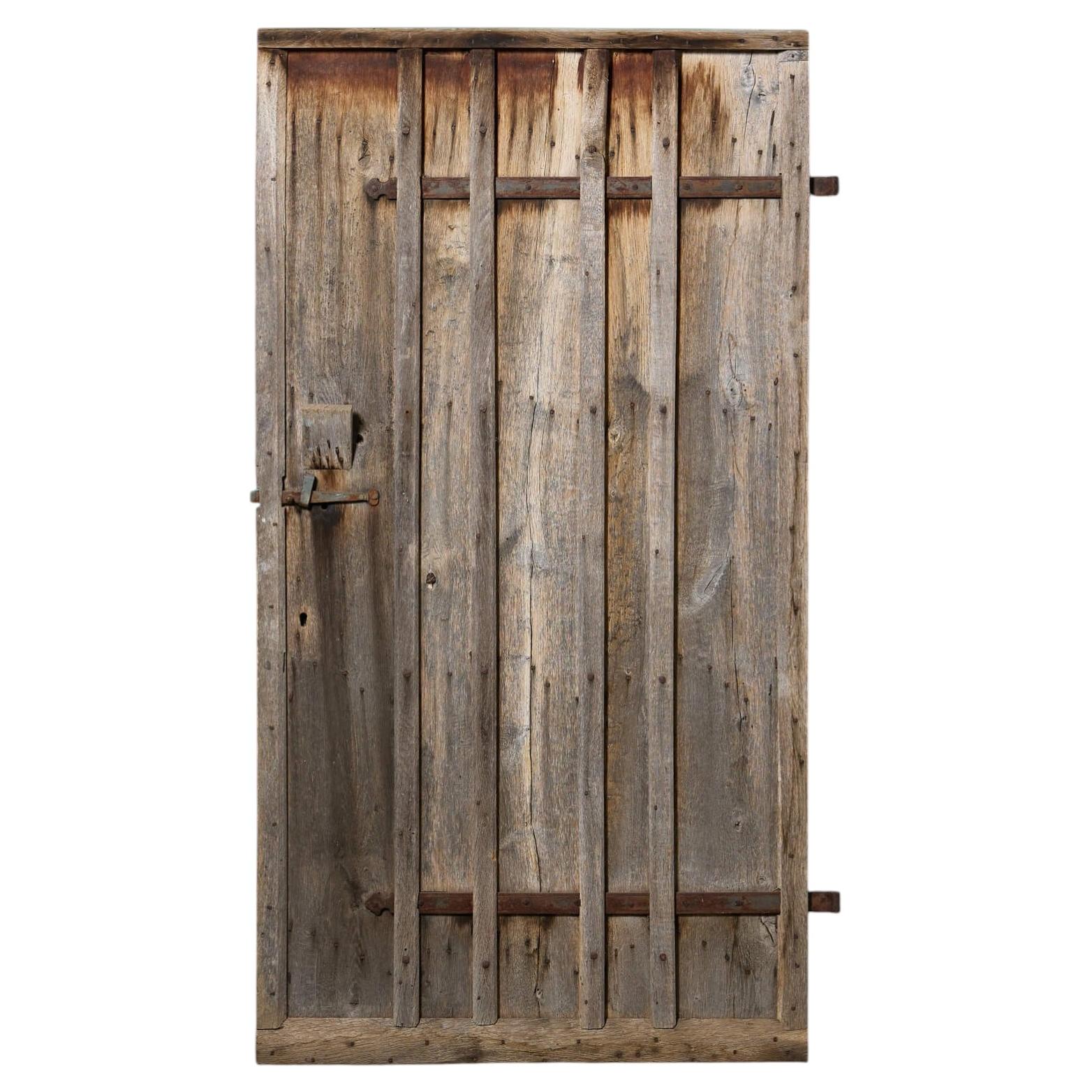 Porte ancienne anglaise en planches de chêne vieilli en vente