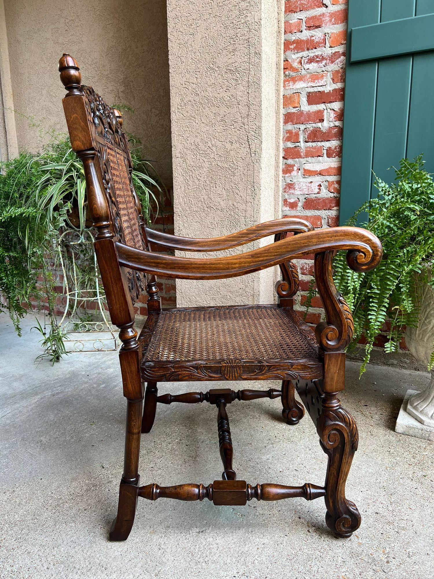 Antique English Arm Chair Carved Oak Cane Seat Renaissance Cherubs Fireside For Sale 4