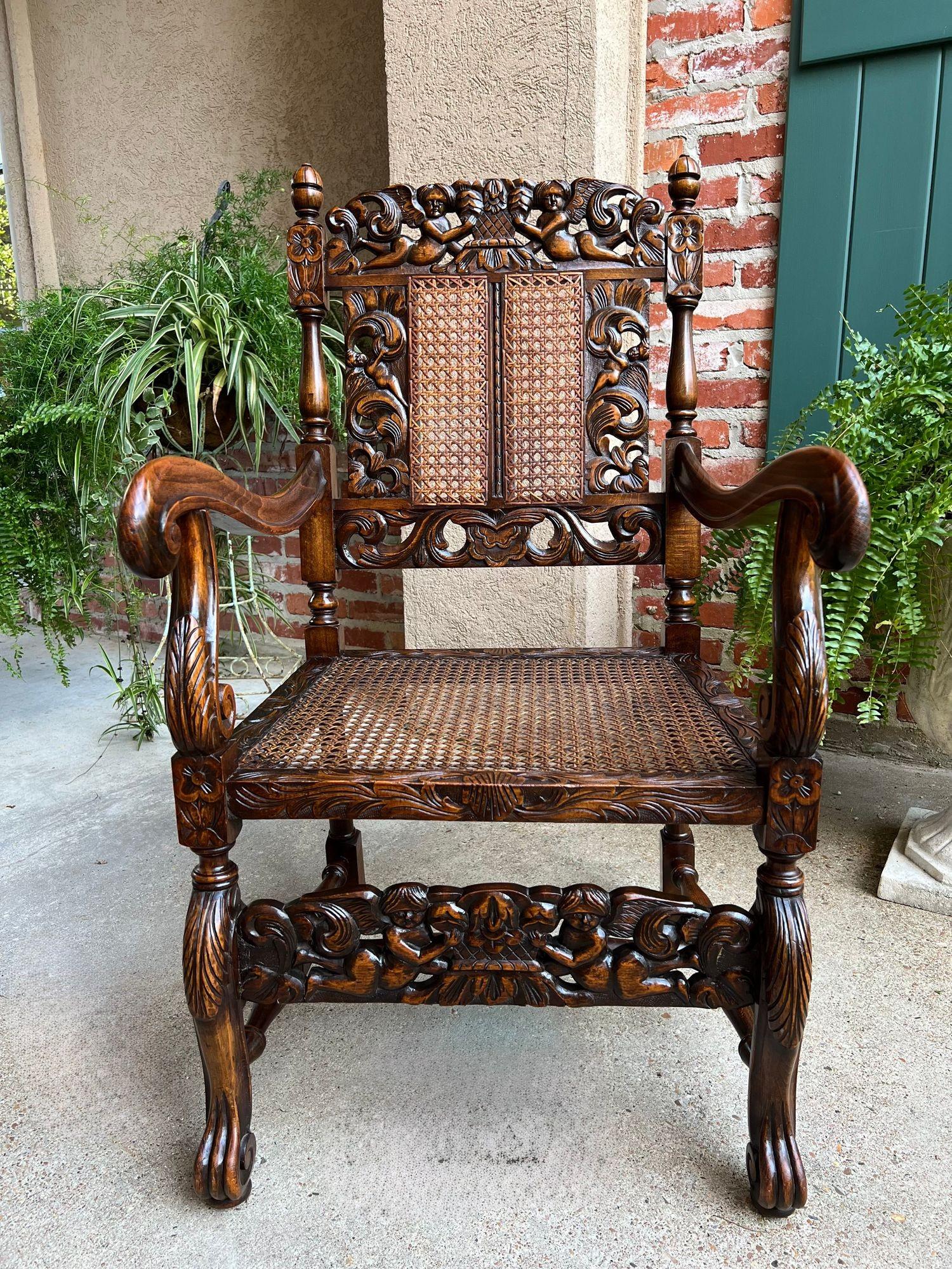 Antique English Arm Chair Carved Oak Cane Seat Renaissance Cherubs Fireside For Sale 7