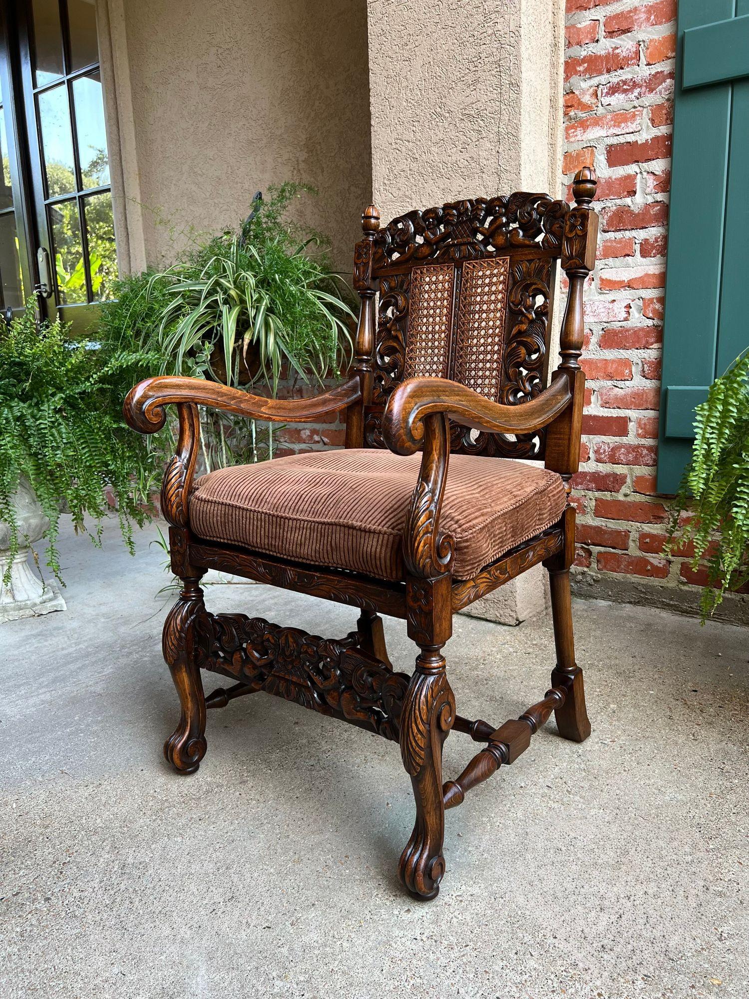 Antique English Arm Chair Carved Oak Cane Seat Renaissance Cherubs Fireside For Sale 8