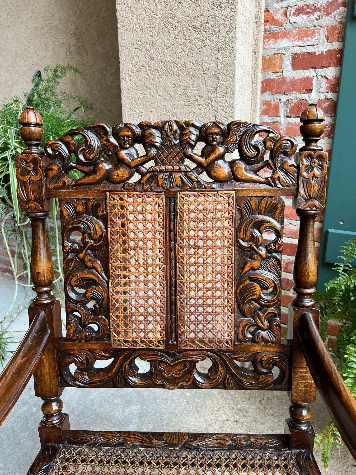Antique English Arm Chair Carved Oak Cane Seat Renaissance Cherubs Fireside For Sale 10