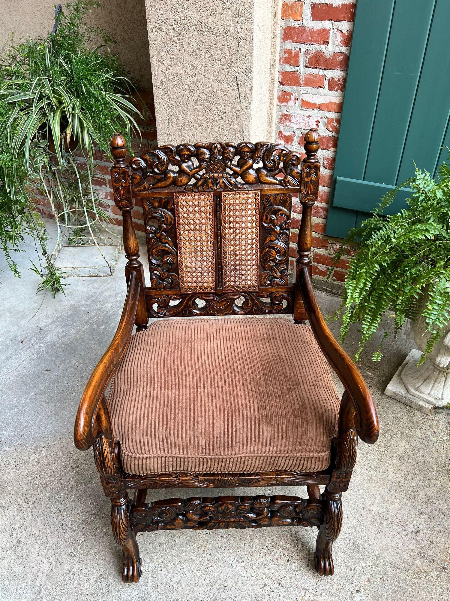 Antique English Arm Chair Carved Oak Cane Seat Renaissance Cherubs Fireside For Sale 14