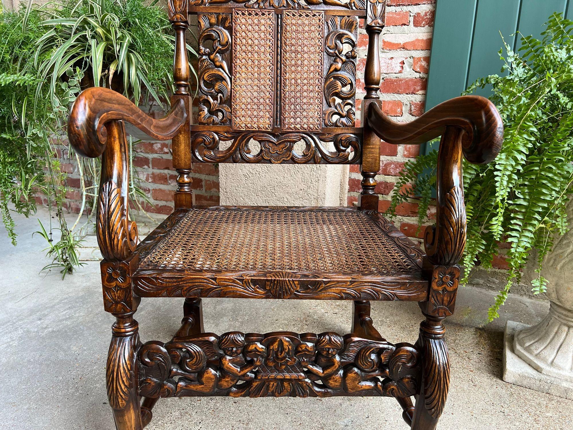 Antique English Arm Chair Carved Oak Cane Seat Renaissance Cherubs Fireside For Sale 1