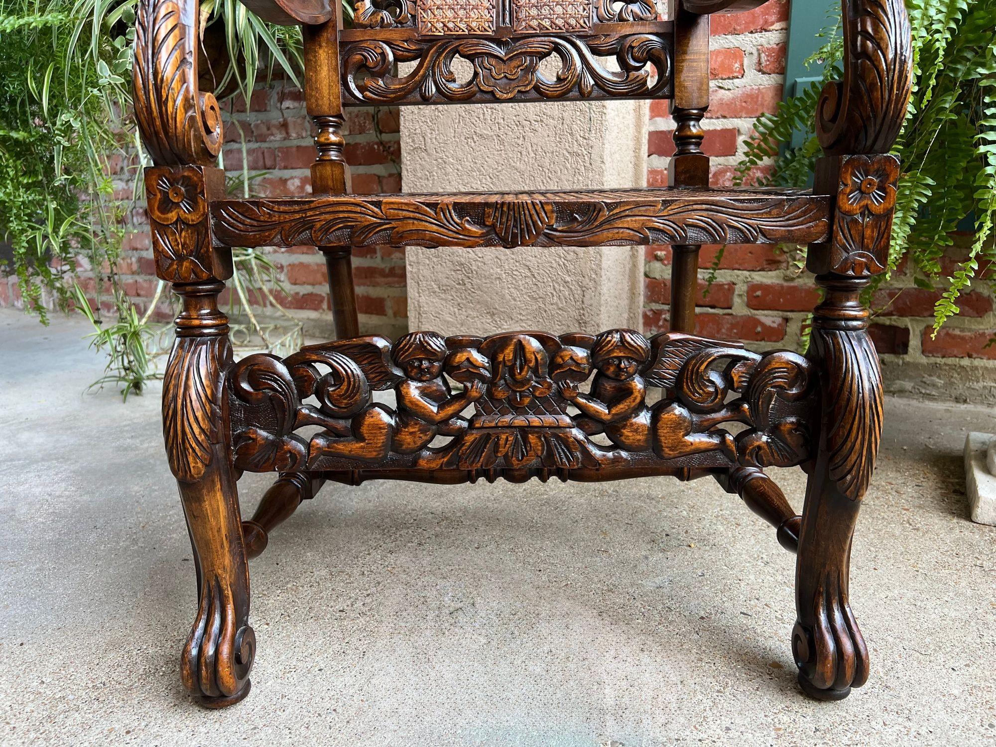 Antique English Arm Chair Carved Oak Cane Seat Renaissance Cherubs Fireside For Sale 2