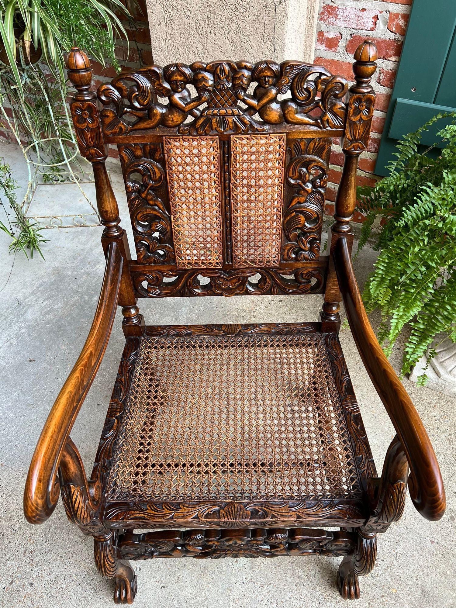 Antique English Arm Chair Carved Oak Cane Seat Renaissance Cherubs Fireside For Sale 3