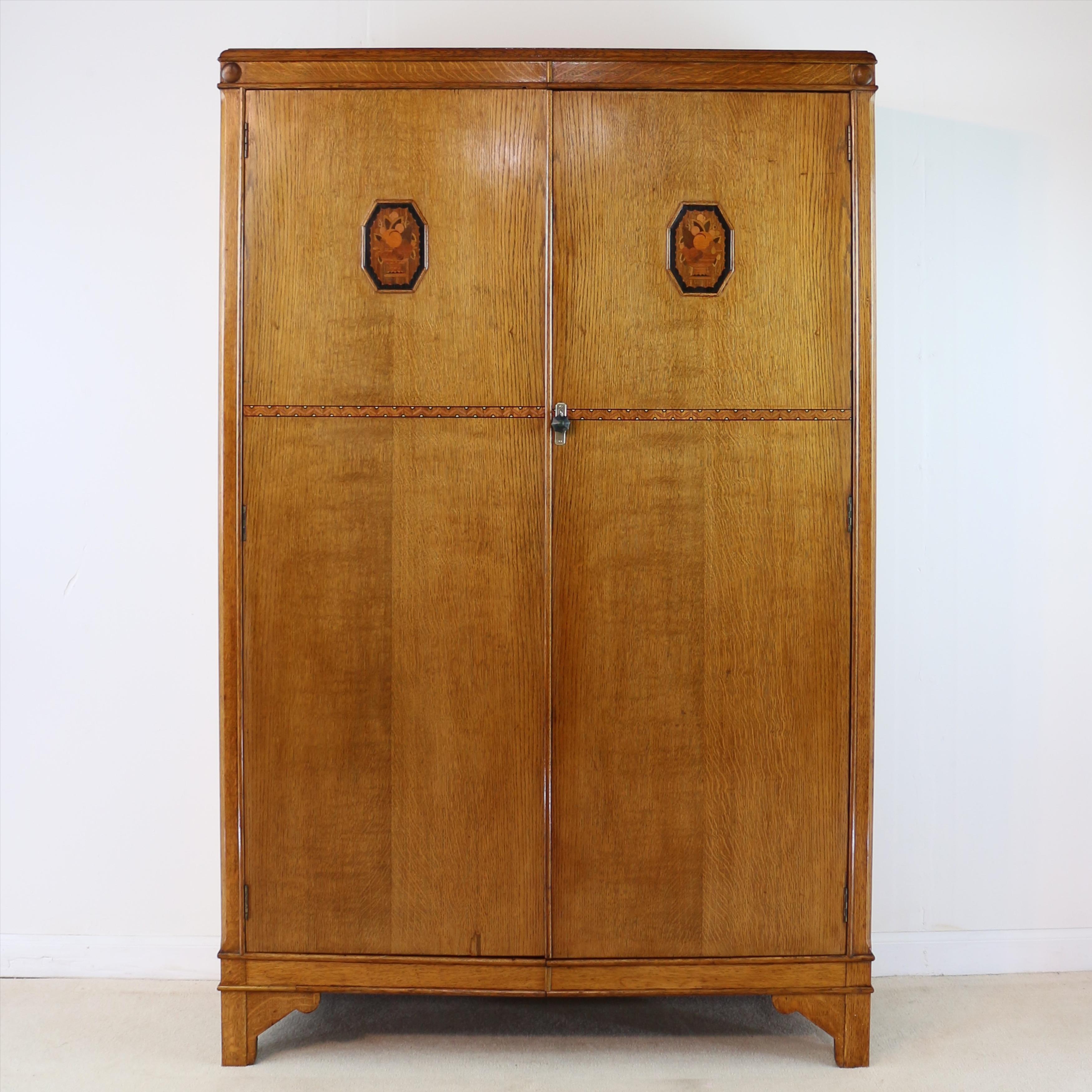 A super three piece Art Deco quarter-sawn oak & marquetry bedroom suite attributed to ‘Gaylayde’ by B Cohen & Sons of London. Dating to c.1930 and of super quality it features intricate geometric inlaid bandings in mahogany, satinwood, ebony and