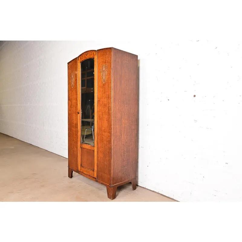 Early 20th Century Antique English Art Nouveau Carved Oak Mirrored Armoire, Circa 1920s For Sale