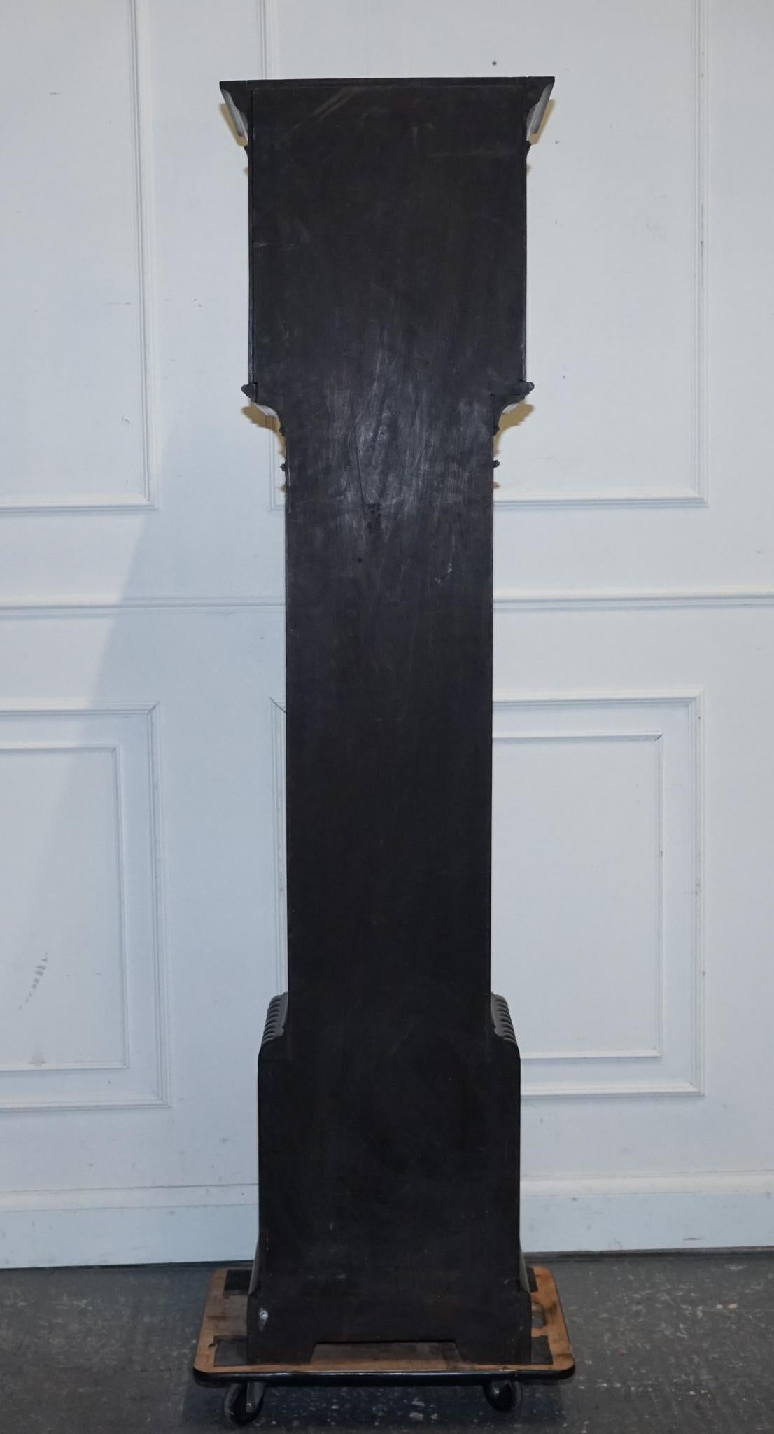 
Antiques of London



A fine late Victorian 8-day longcase (grandfather) clock, retailed by Maple & Co London, dating from around 1890 and crafted in the Arts & Crafts style.

This elegant clock features a beautifully proportioned oak case with