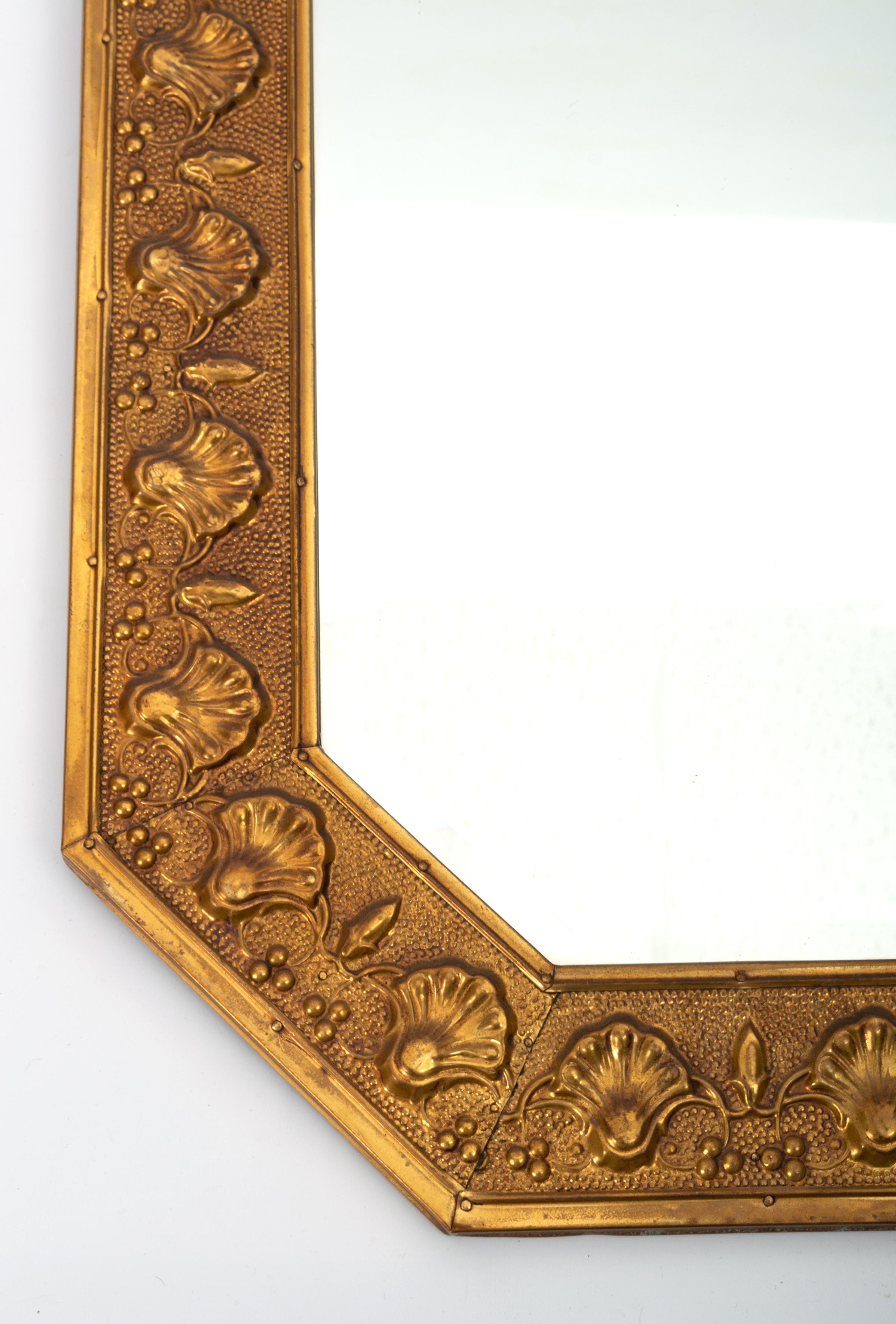 Antique English Arts & Crafts Long Octagonal Repousse Brass Mirror C.1920

In very good condition commensurate with age.