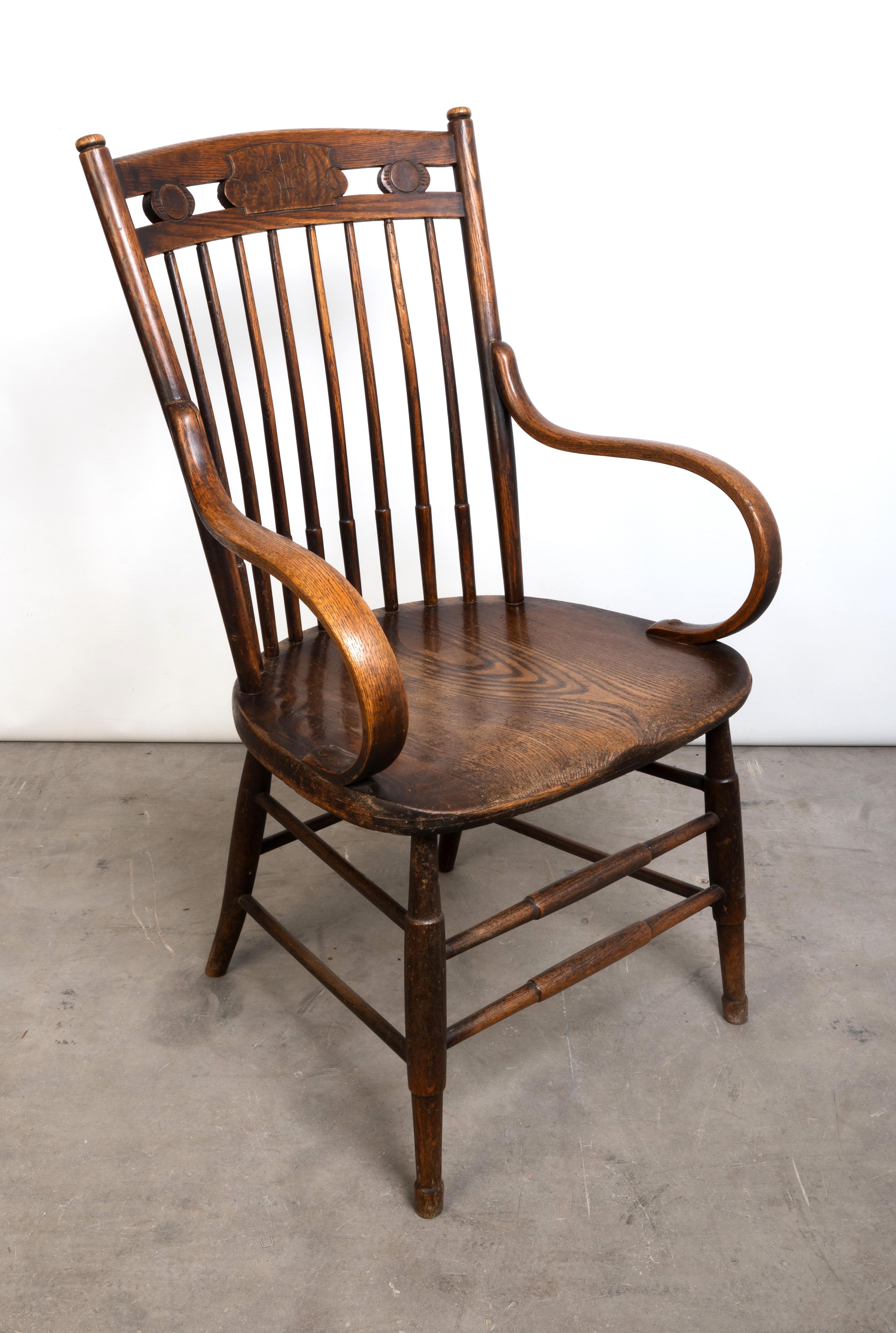Antique English Arts & Crafts Stick Back Windsor Chair, 
Heals Of London
Oak construction
circa1900
Very good condition commensurate of age.


In good condition commensurate with age. Solid and sturdy. Minor movement to arms.