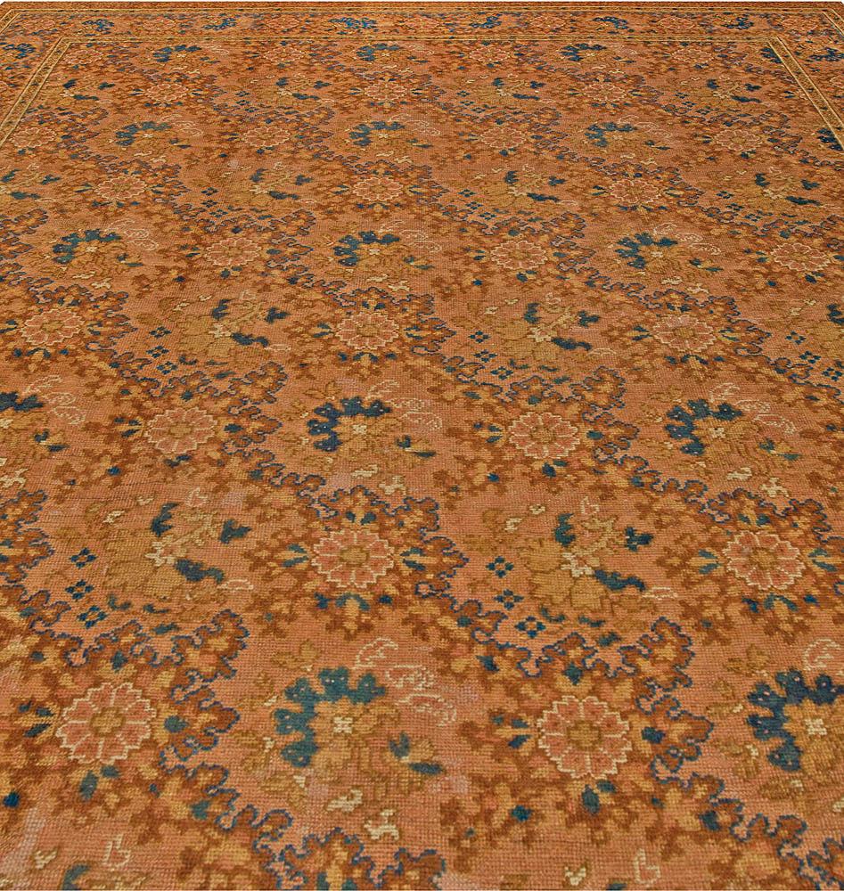 Antique English Axminster botanic brown, blue wool carpet
Size: 13'9