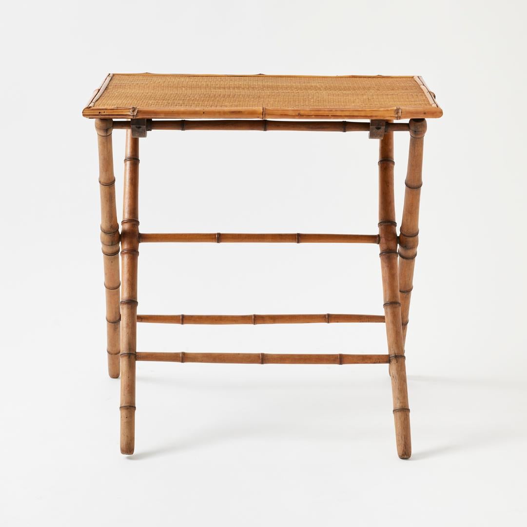 - A classic accent piece with a twist, this vintage bamboo and grasscloth table is fully collapsible, making it a chic and transitional addition to a porch or living room.

- Easily assembled and stowed away, this table would make an ideal drinks