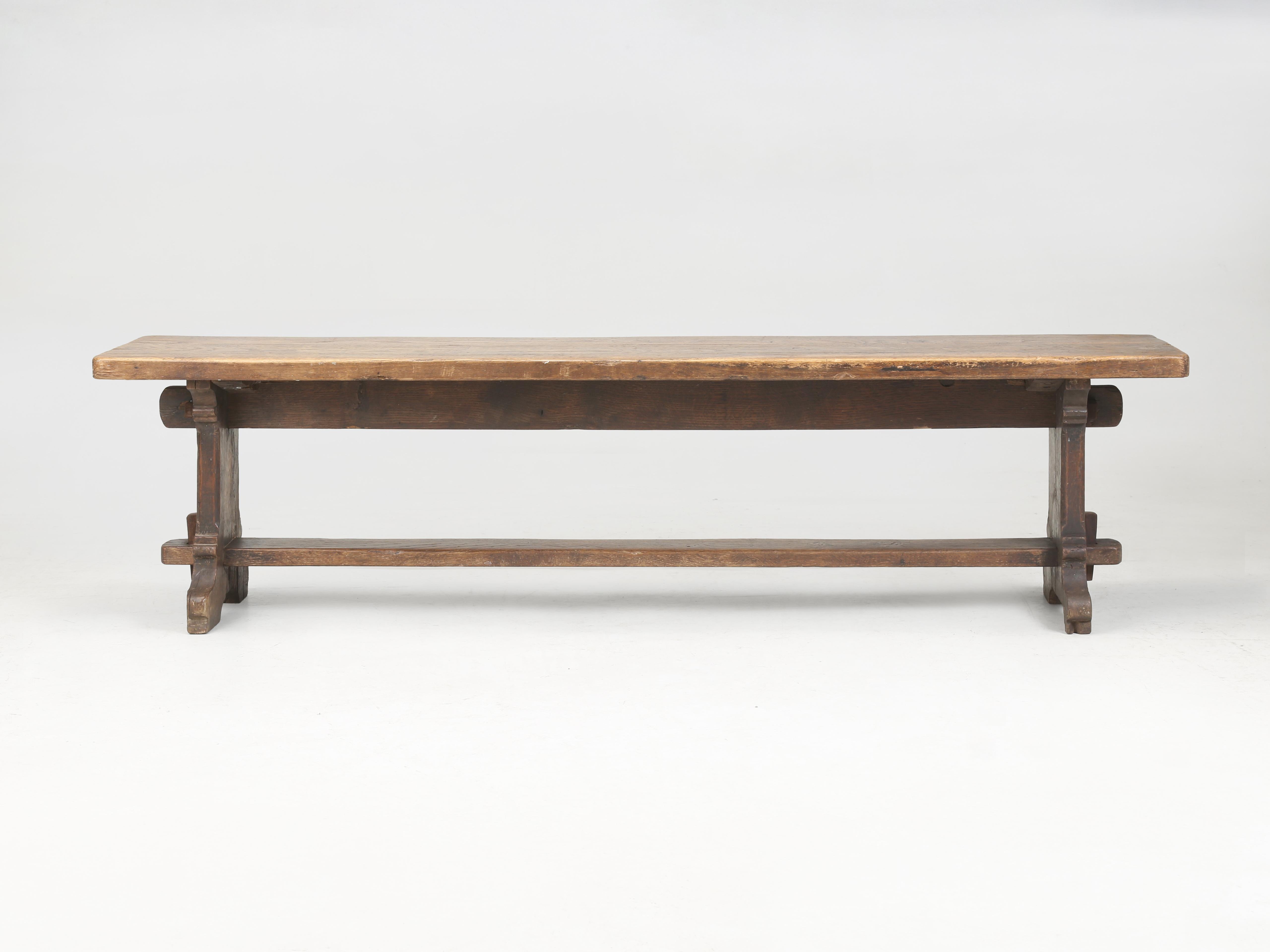Antique English Bench in Solid Oak and Probably Over 200-years old Very Original Condition. This Antique English Oak Bench arrived along with our 300-year old English Farm Table that all or us are completely enamored with, for it is not very often
