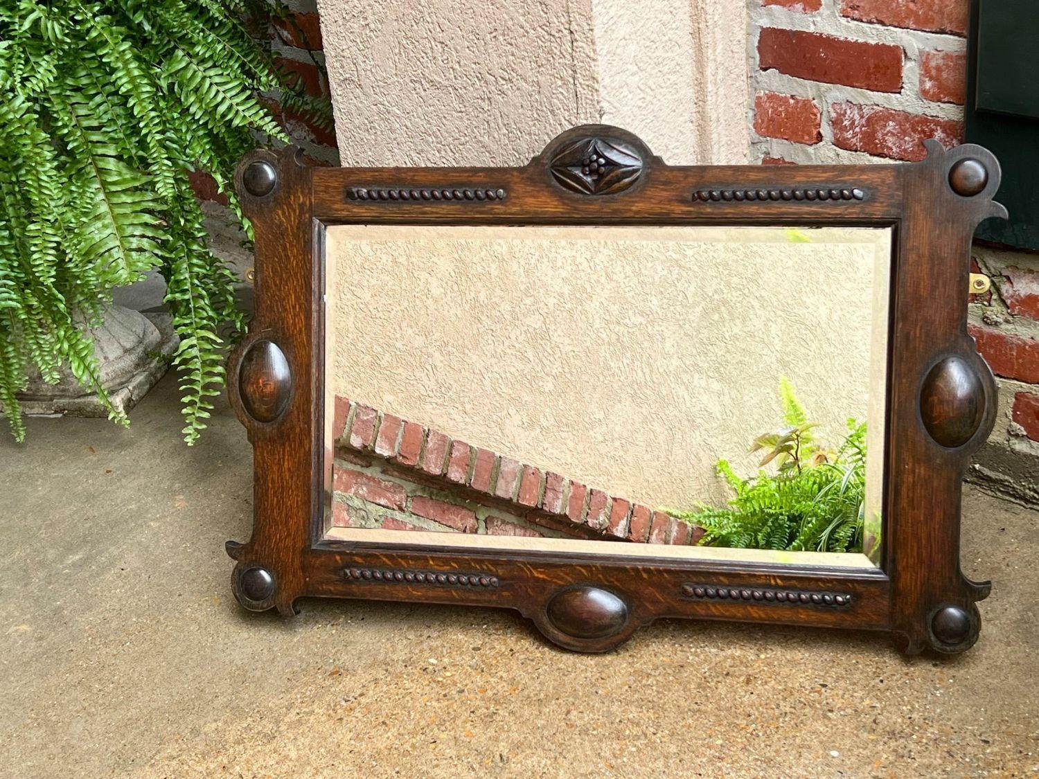 Antique English Beveled Wall Mirror Carved Oak Frame Jacobean Arts & Crafts In Good Condition In Shreveport, LA