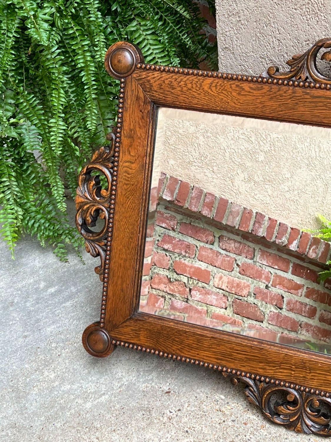 Antique English Beveled Wall Mirror Carved Oak Frame Jacobean Arts & Crafts For Sale 1