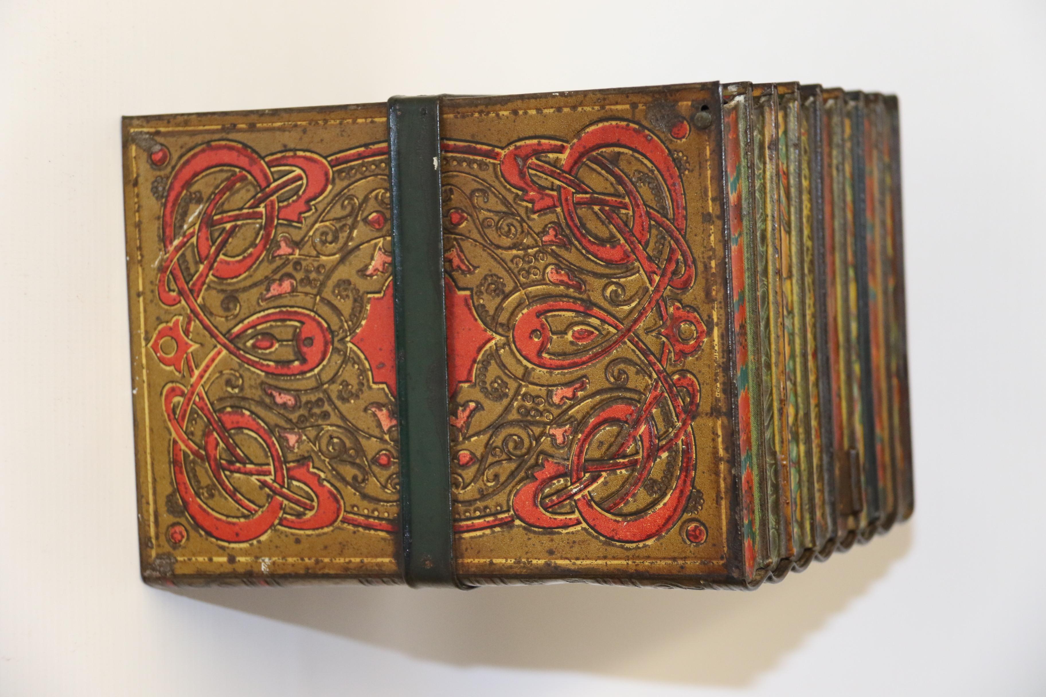 Painted Antique English Biscuit Tin in the Form of Books, circa 1900 For Sale