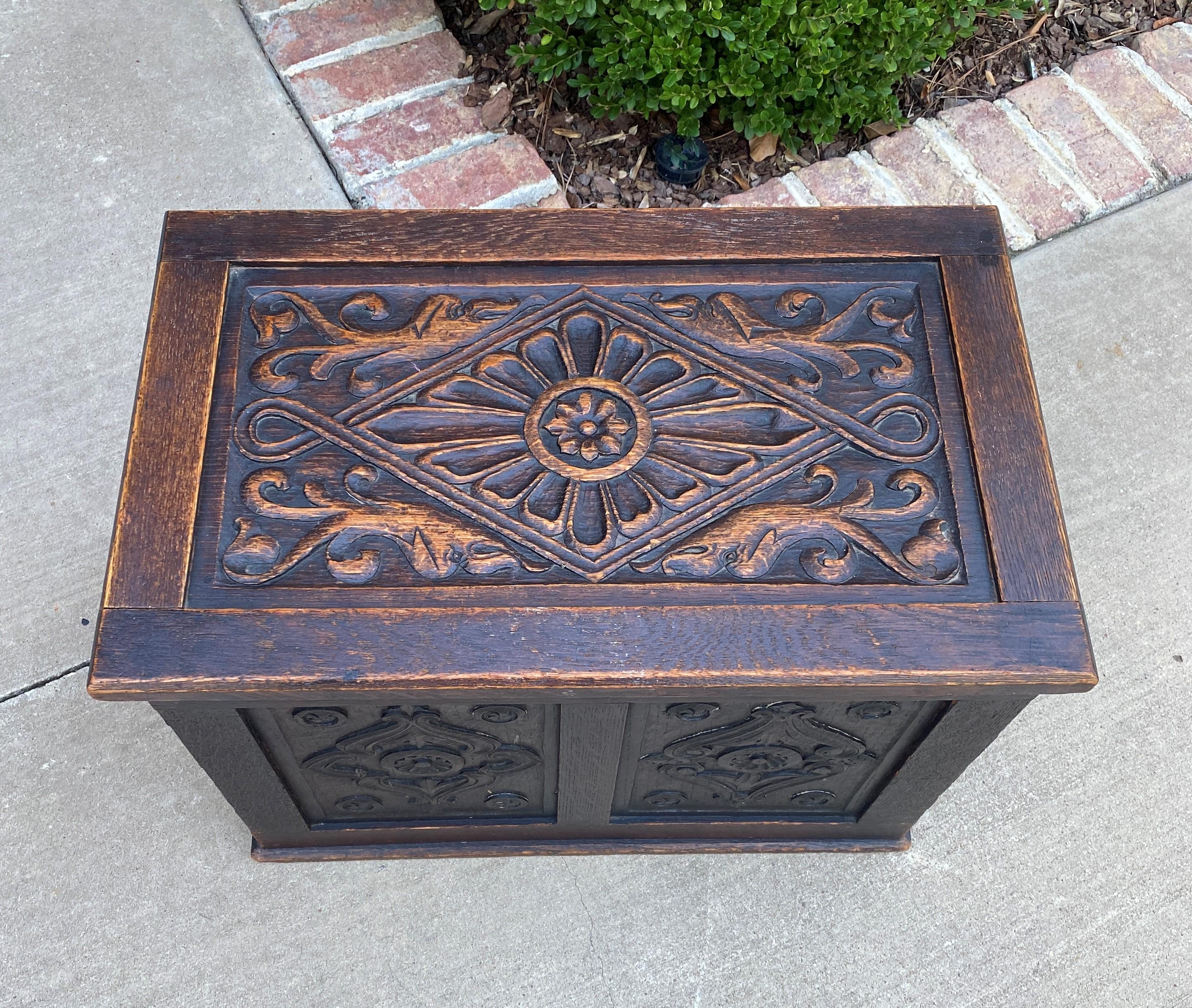 CHARMING Antique English HIGHLY CARVED Oak Blanket Box, Coffer, Trunk, Storage Chest or Bench~~PETITE SIZE

These chests were originally used as strongboxes for holding money, jewelry and other valuables~~the perfect size for storage of blankets
