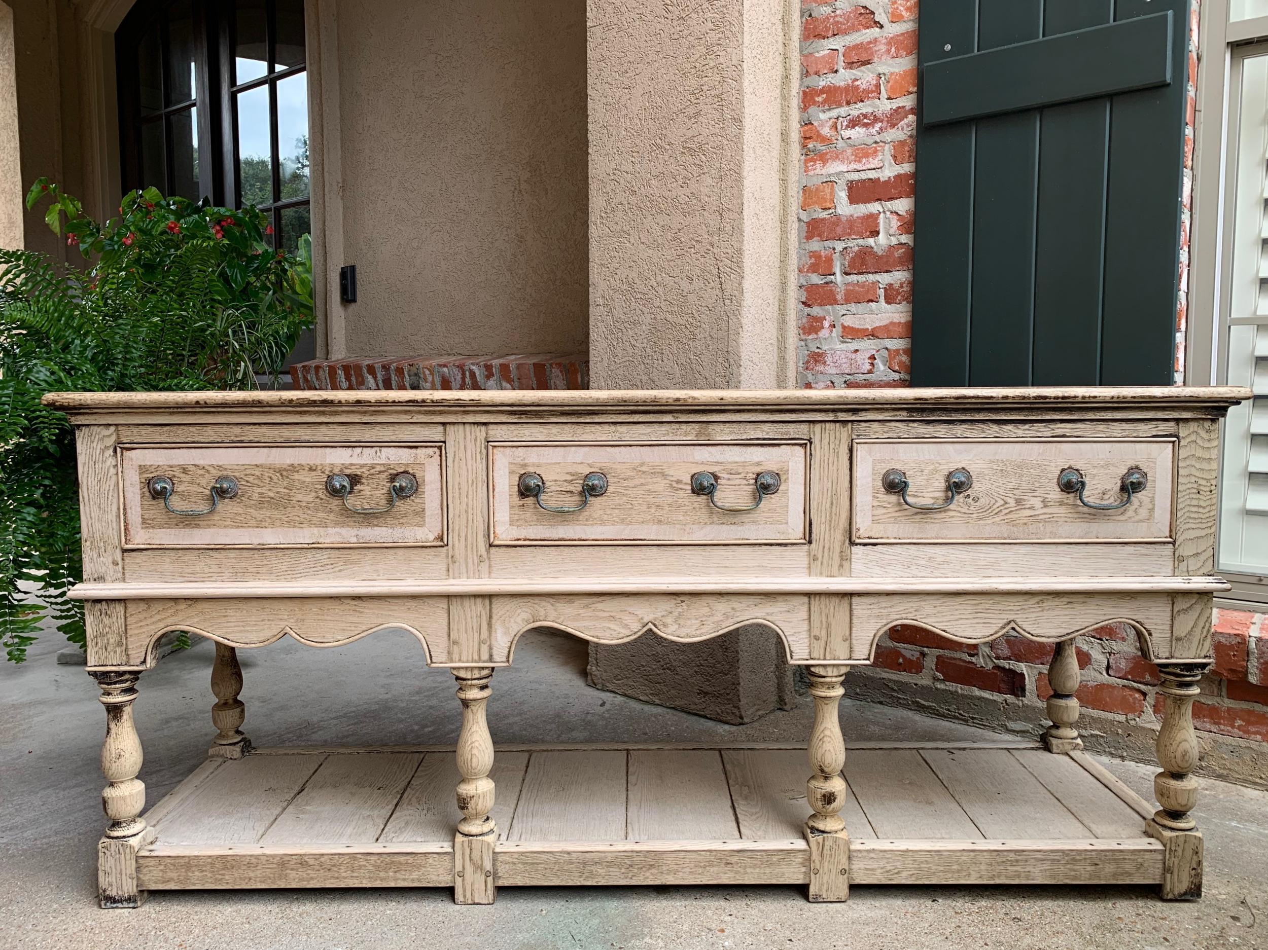 Antique English bleached oak sideboard sofa table 5.5 ft. Farmhouse Credenza

~Direct from England~
~Large, 5.5 ft. antique English sideboard/credenza with traditional British style and beautiful features!~
~Three banded drawers across the