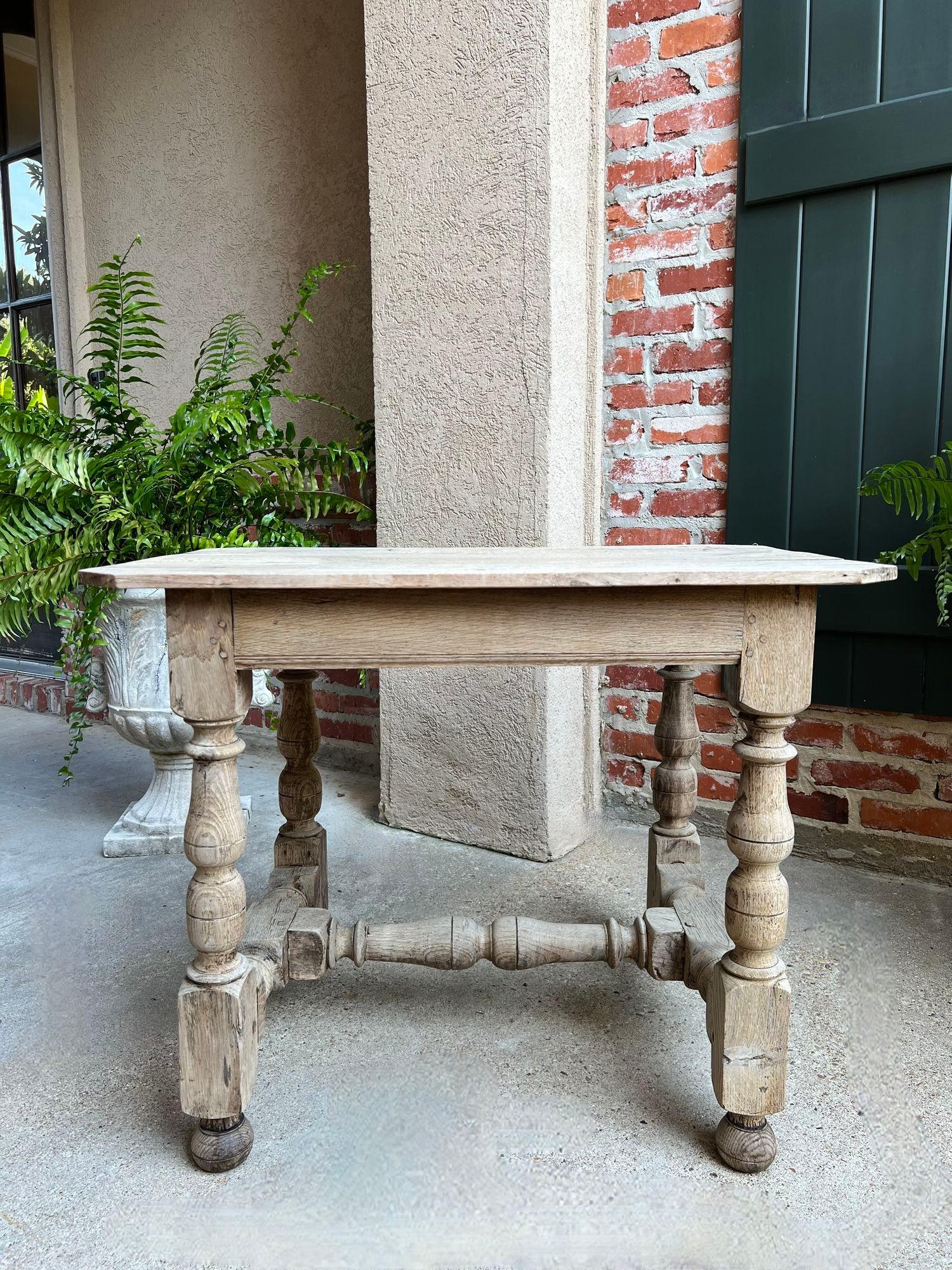 Antique English Bleached Sofa Side Table Console Stripped Jacobean Oak c1850.

Direct from Europe, a charming antique English side table, in solid oak, with a gorgeous patina--recently bleached for today’s home!
Old World character throughout, from