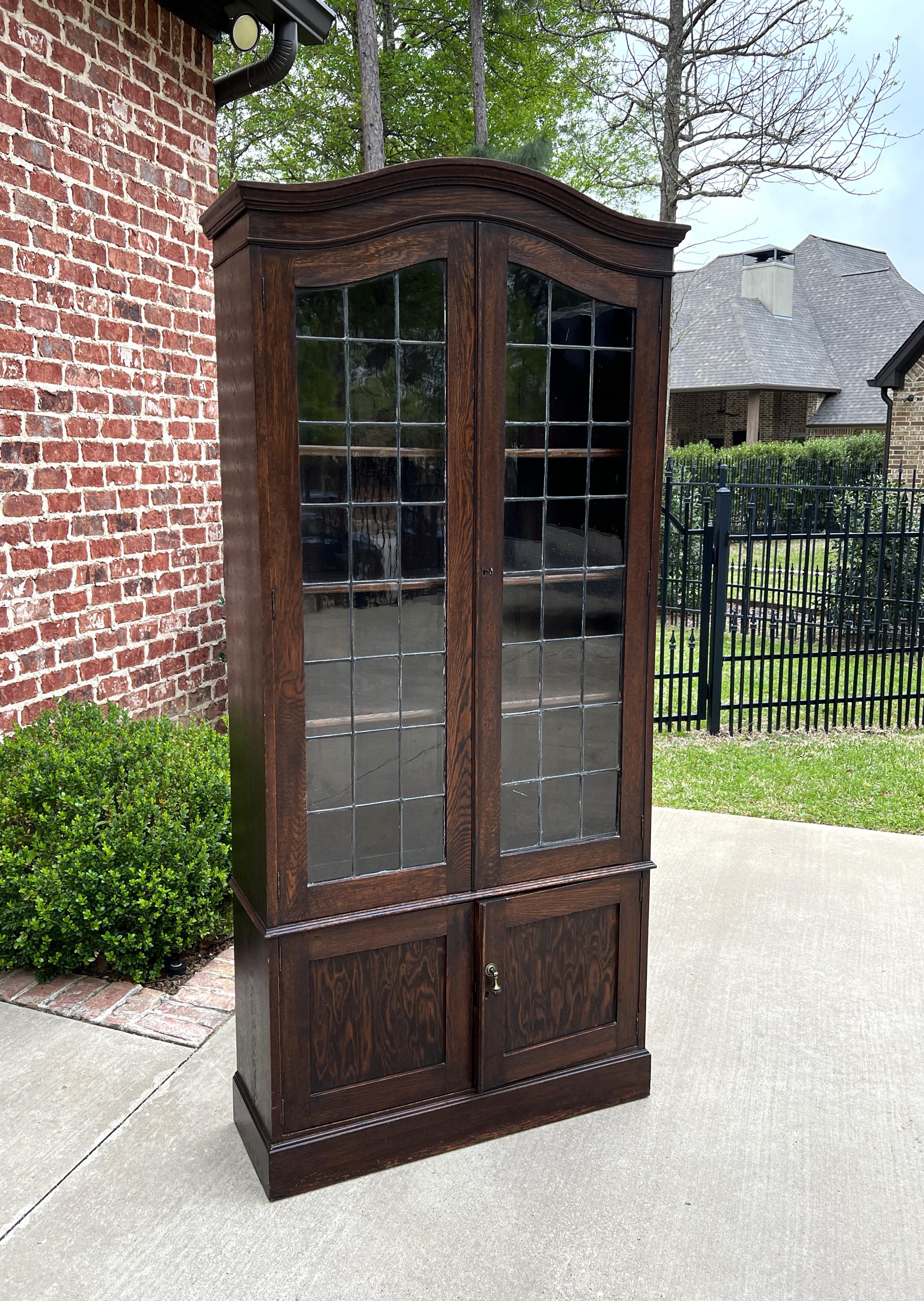 Antique English Bookcase Display Cabinet Leaded Glass Doors Bonnet Top Oak In Good Condition In Tyler, TX