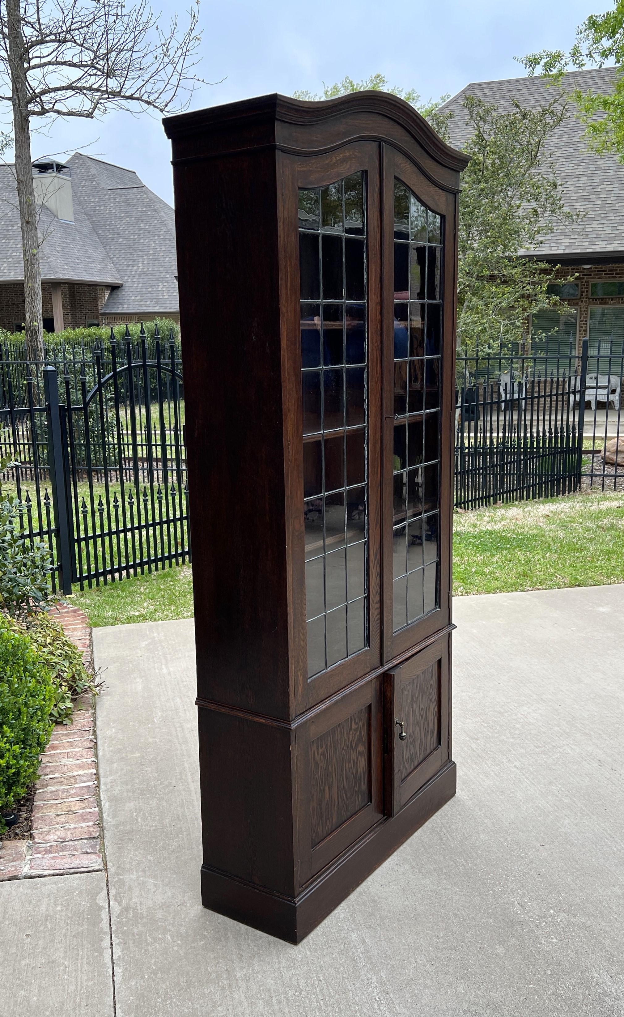 Early 20th Century Antique English Bookcase Display Cabinet Leaded Glass Doors Bonnet Top Oak