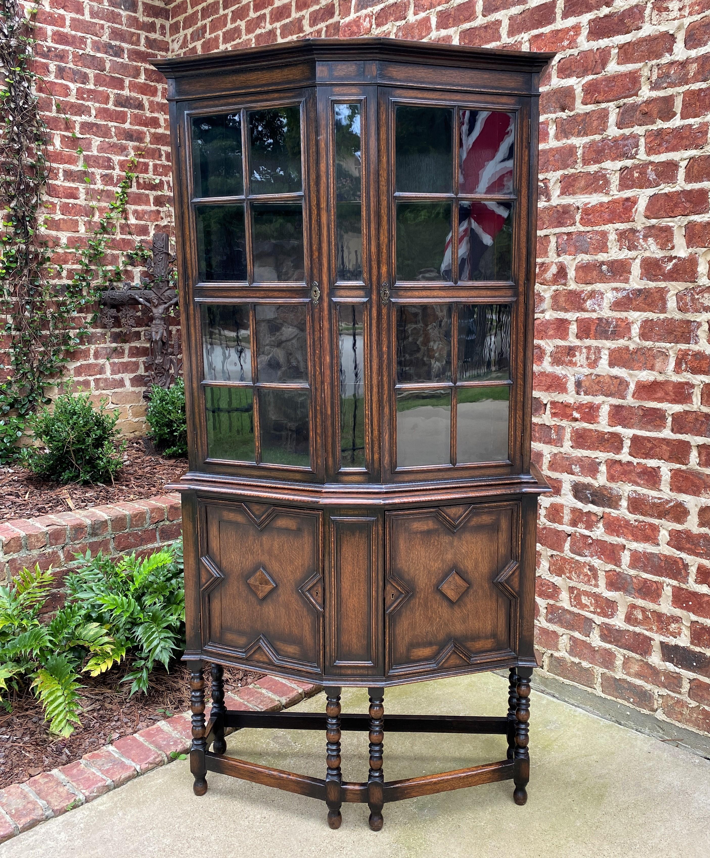 Gorgeous Antique English Oak Jacobean or Tudor Style Double-Door Bookcase, Display/China Cabinet, or Vitrine~~c. 1900 

Highly sought after Jacobean style with geometric carvings and trim~~original 