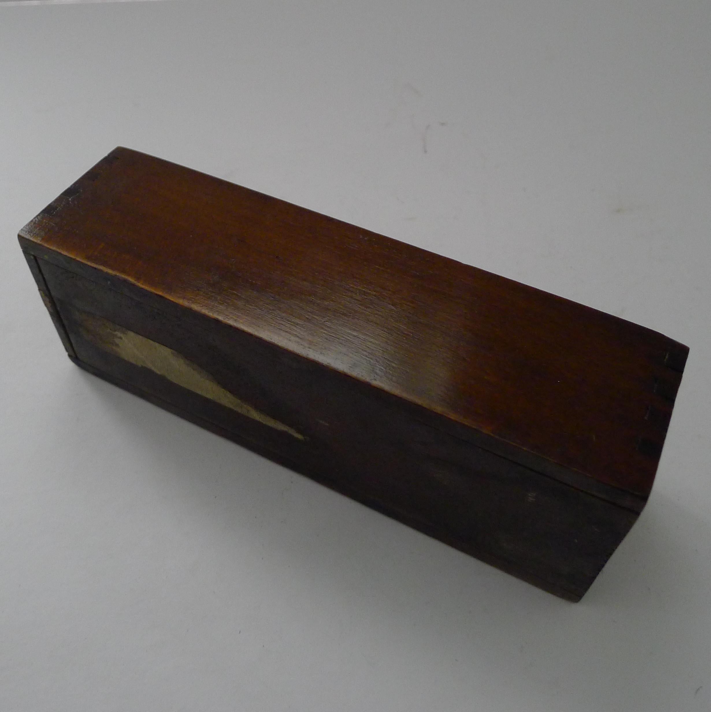 A charming set of late Victorian dominoes or dominos, complete with a handsome polished wooden storage box with a sliding lid.

Dating to around 1900, the set is better than many, with a quality finish, each Domino with rounded edges, the bone and