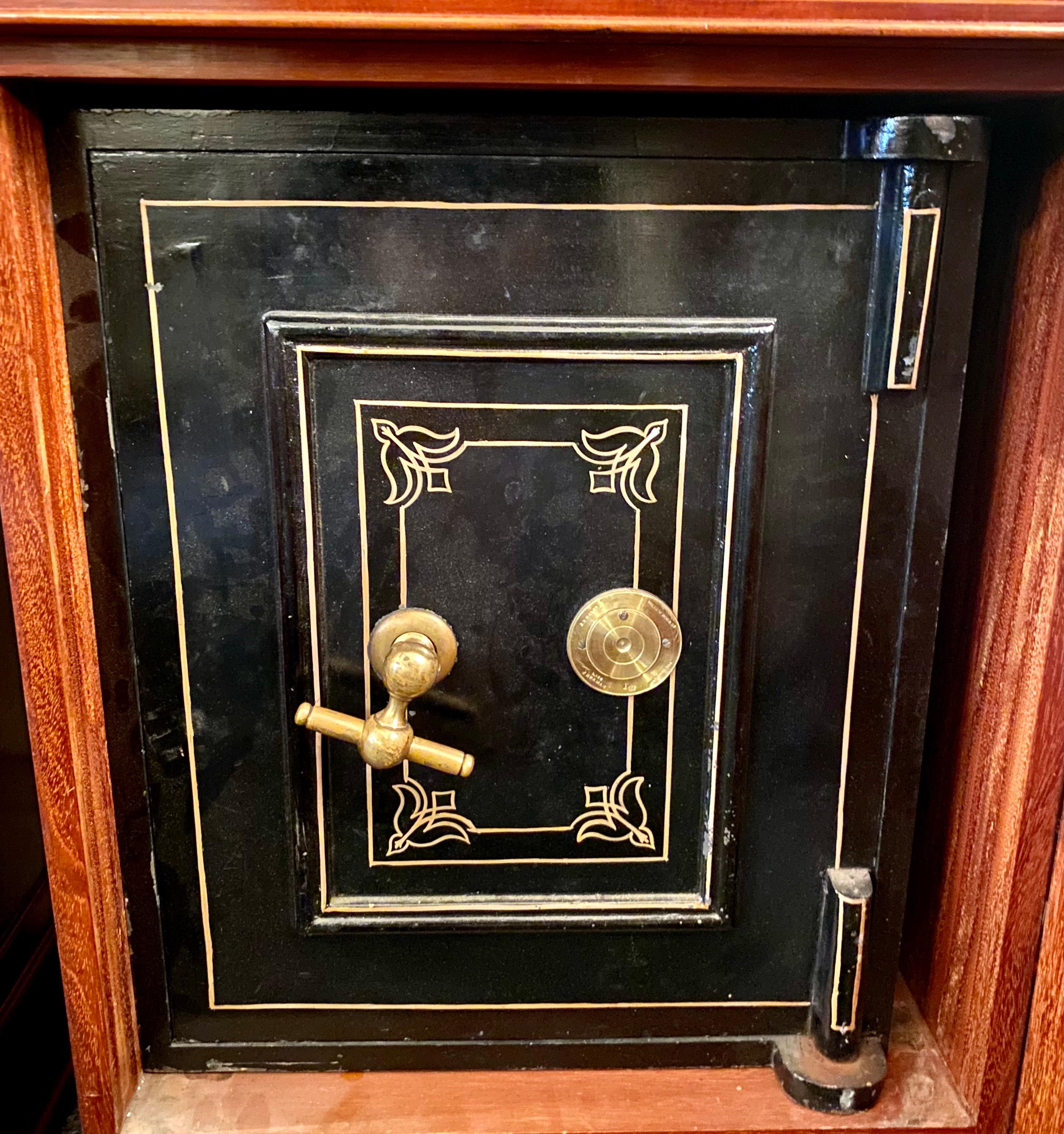 Antique English Bramah mahogany collector's cabinet/chest with hidden safe, Circa 1880.
The iron safe has a brass handle and lock plate and is marked 