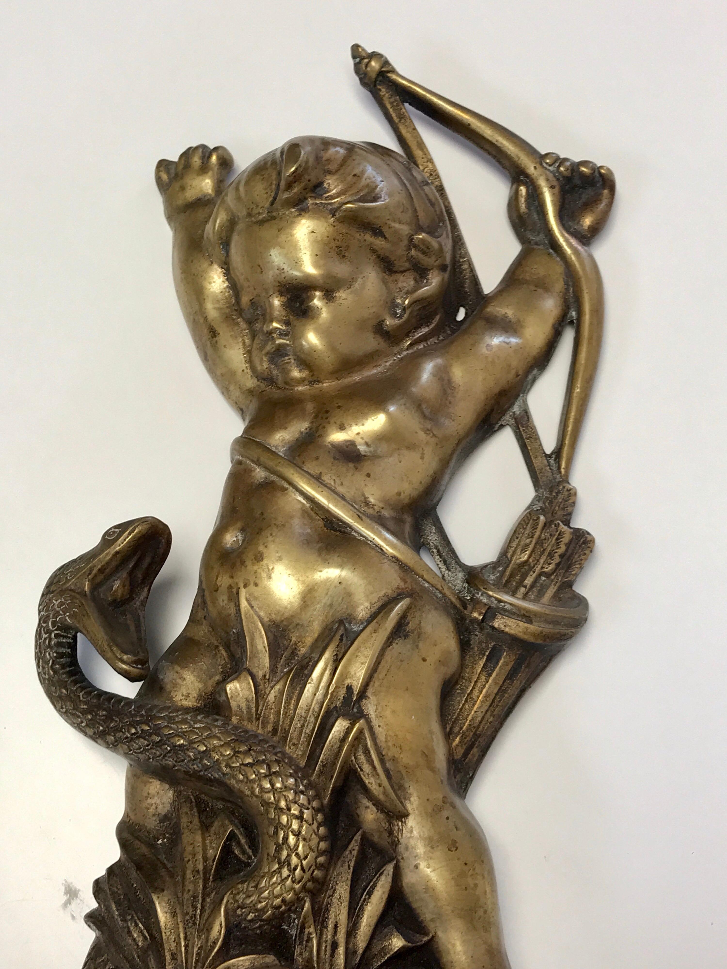 High Victorian Antique English Brass and Iron Cupid with Serpent Doorstop