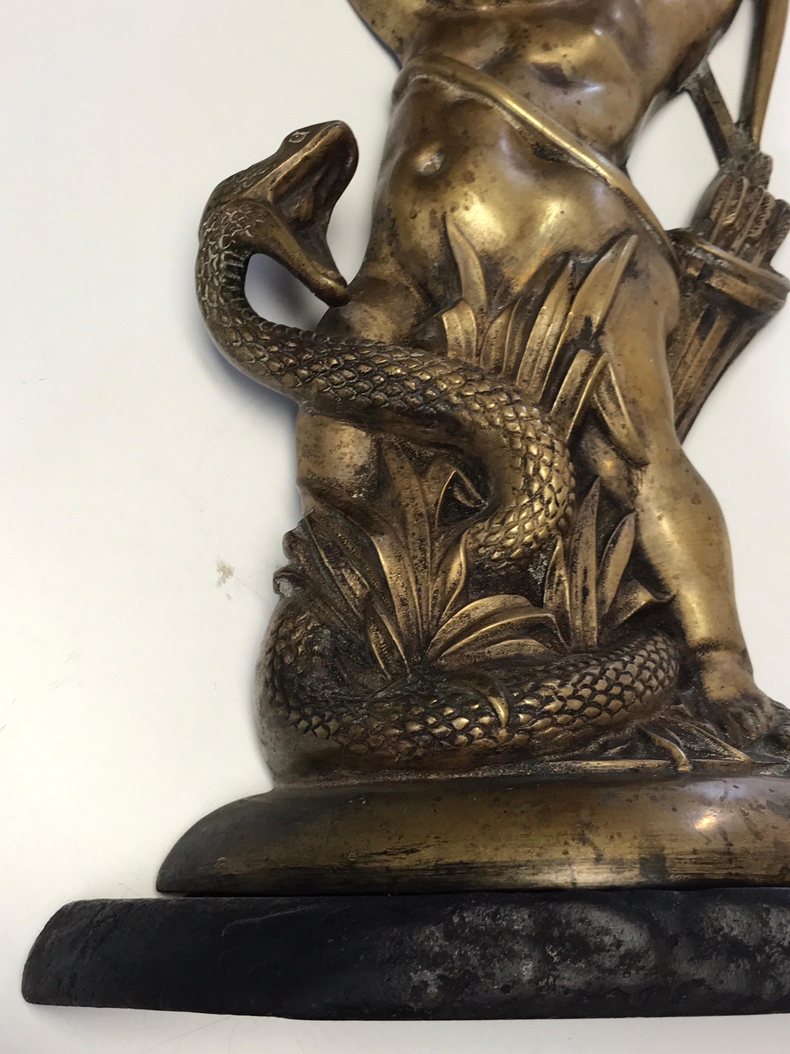 Cast Antique English Brass and Iron Cupid with Serpent Doorstop