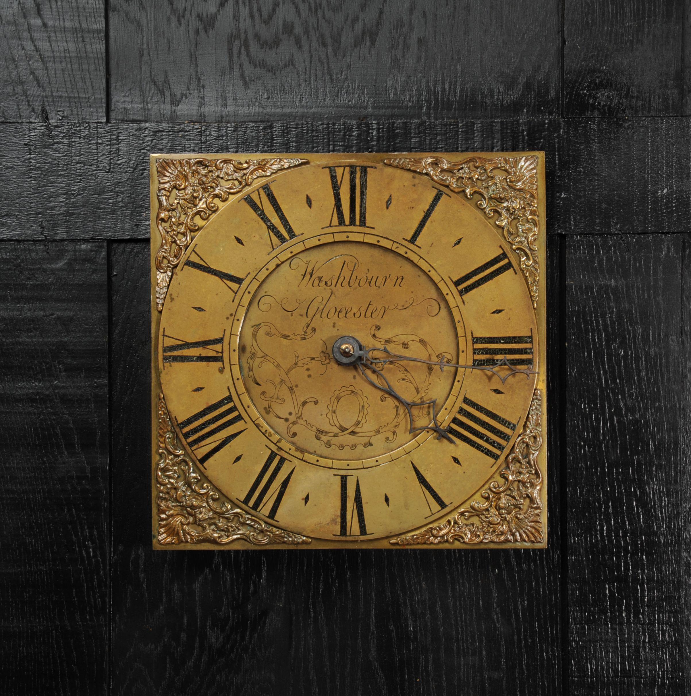 A beautiful antique English clock dial dating from around 1770 by Washbourne of Gloucester. Heavy cast brass with cast spandrels and engraved numbers filled with ancient black wax. Reclaimed from a crumbling water mill by our buyer it has a lovely
