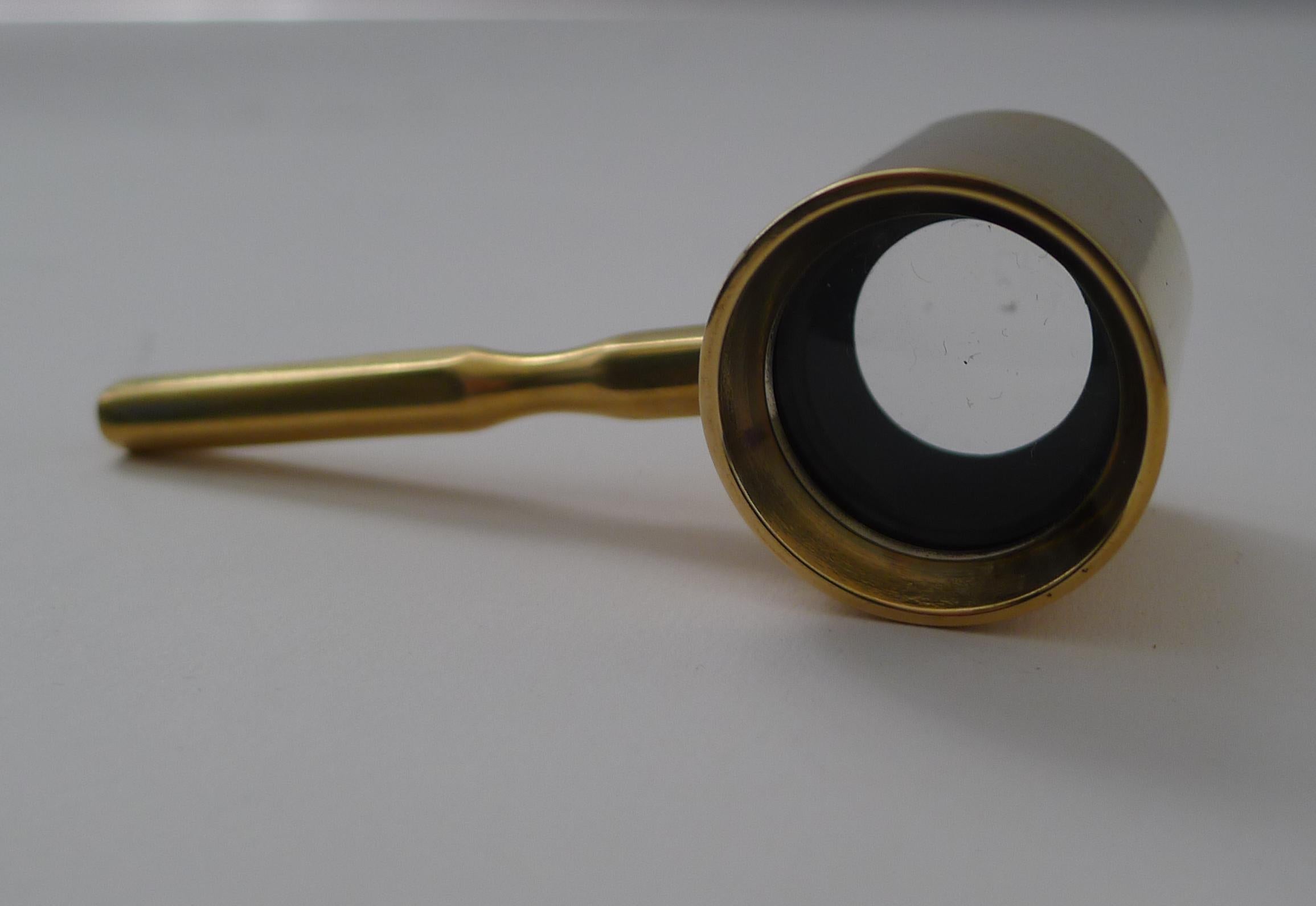 An unusual late nineteenth century Coddington magnifying glass made from English brass having been professionally polished.

Excellent condition measuring 3