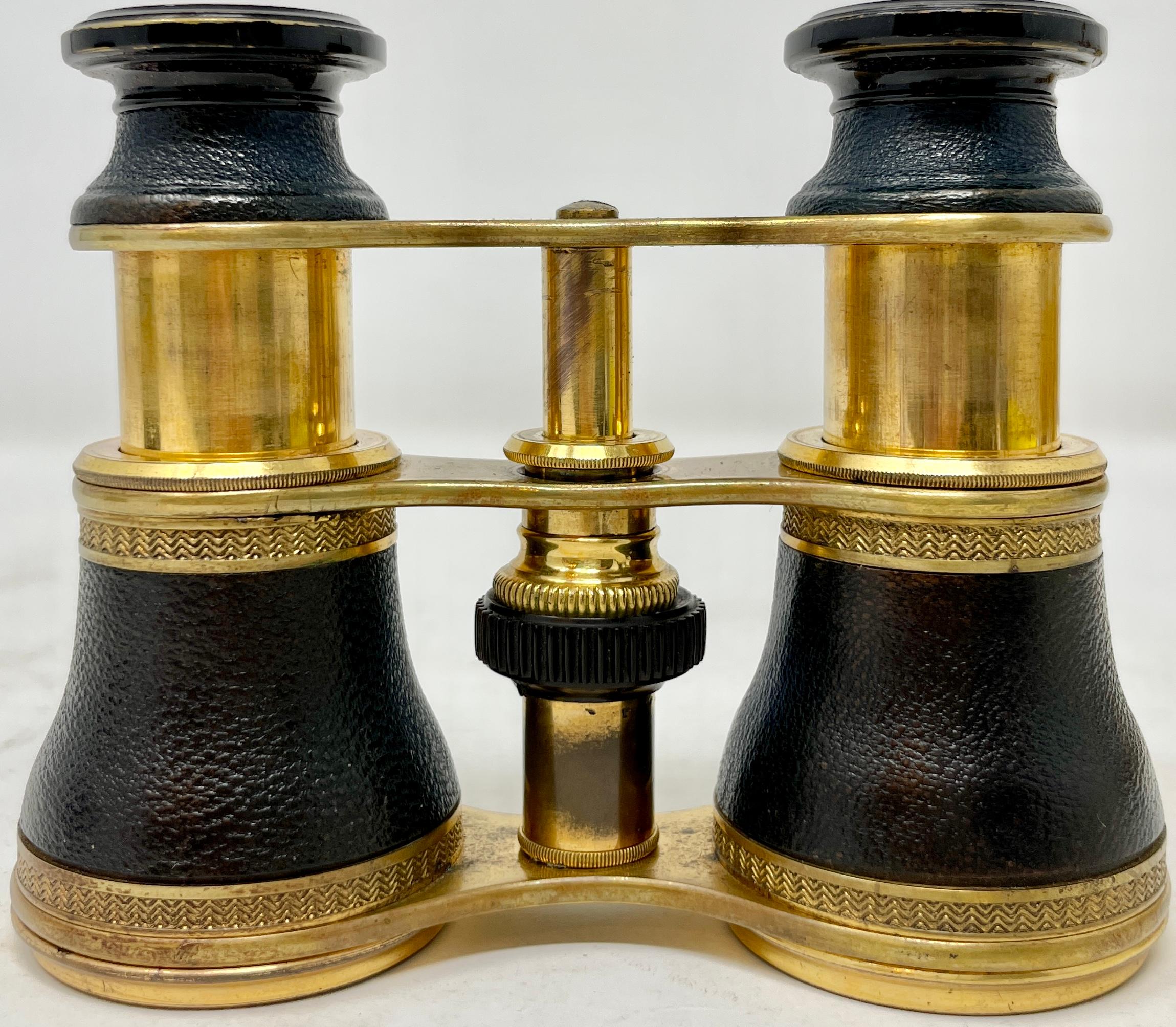 Petite Antique English Brass & Leather Telescoping Binoculars in Original Case, Circa 1900s.
Binoculars are in Working Order.