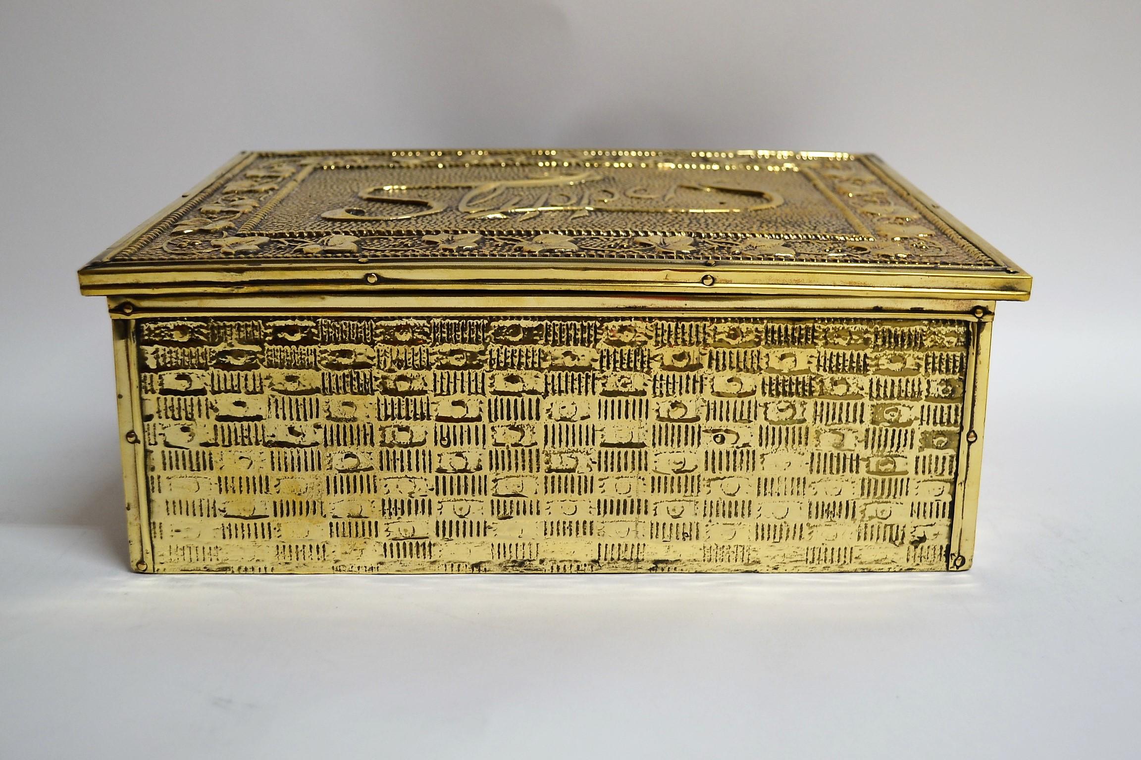 Antique English brass slipper box. This box is lined with wood, and it would have been placed near the fireplace to warm one's slippers.