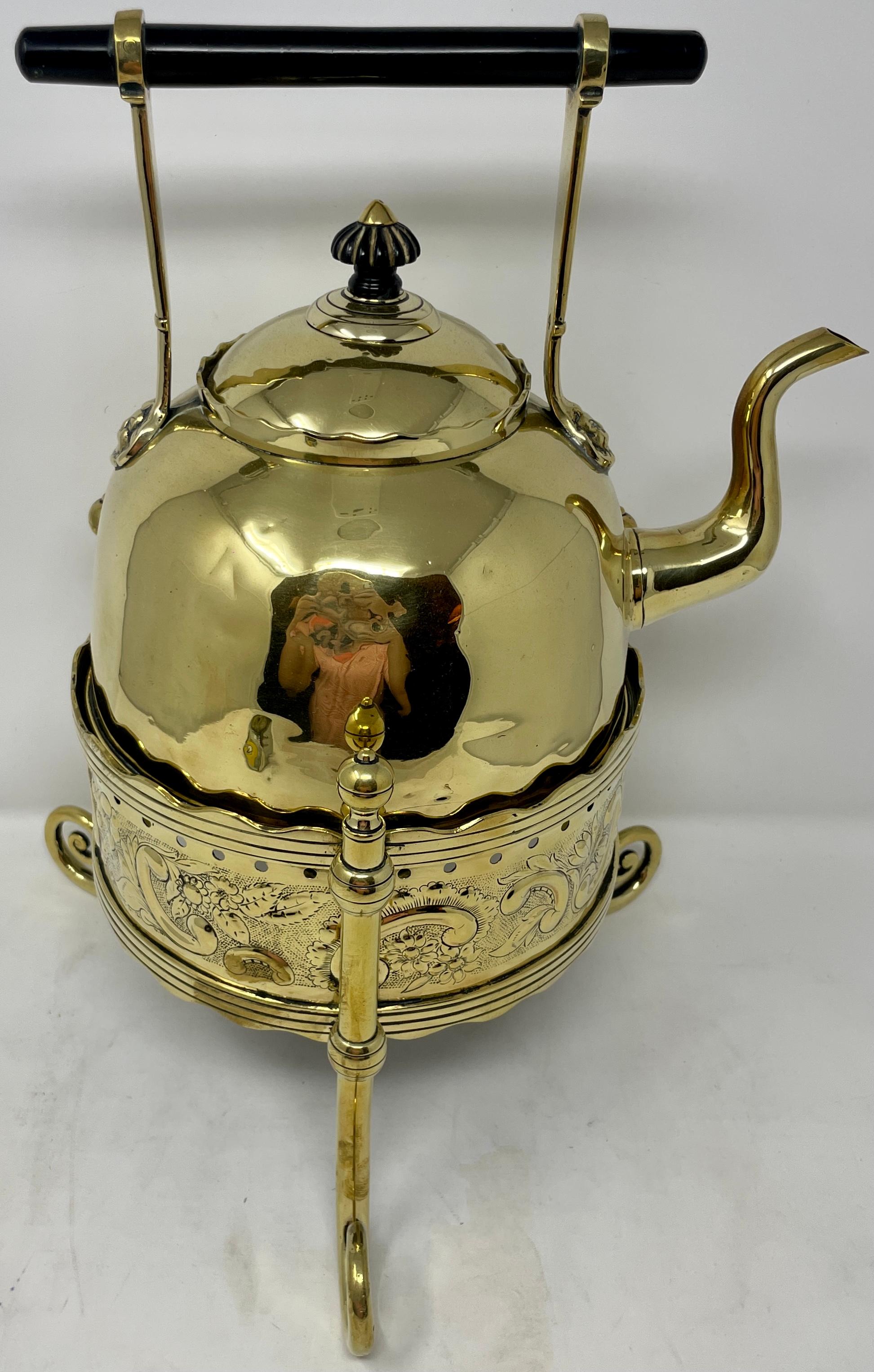 Antique English brass tea kettle on stand, circa 1880.