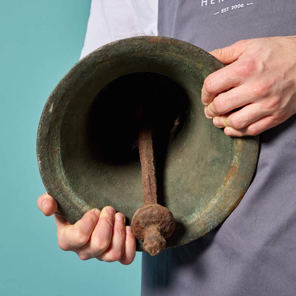 One of three near identical antique English bronze bells reclaimed from a Victorian School in Norfolk. This wonderful bell would be a lovely new element for a period property, entrance to a business or shop, perhaps even a church.

This bell has