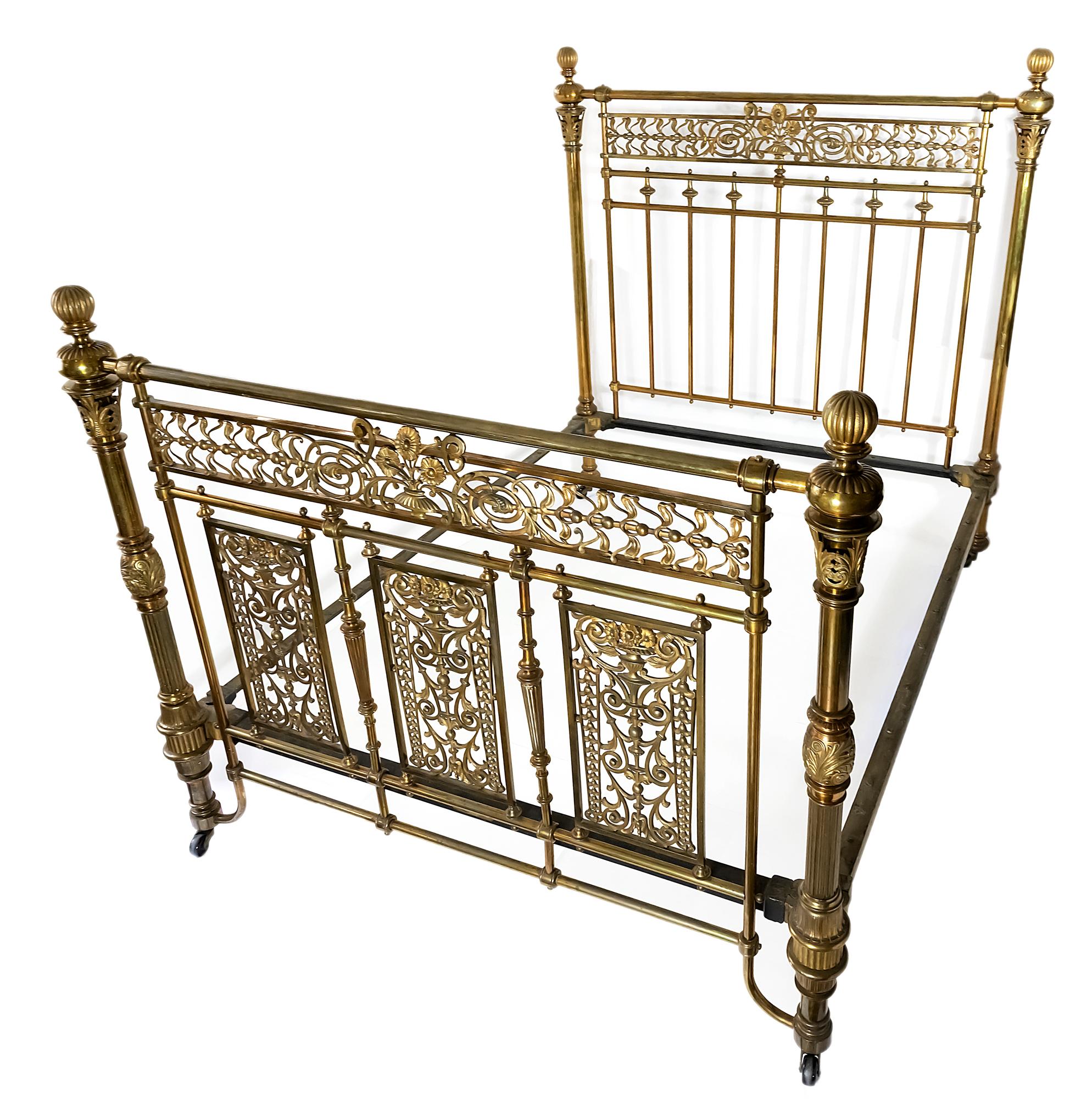 Antique English bronze double bed/frame, circa 1880, produced and signed by Winfields Limited.
The main construction is in iron.
The construction is decorated with solid bronze details and floral ornaments in Art Nouveau style.
The bed legs are