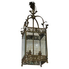 Antico lampadario a lanterna inglese Regency in bronzo con teste di leone e grifoni