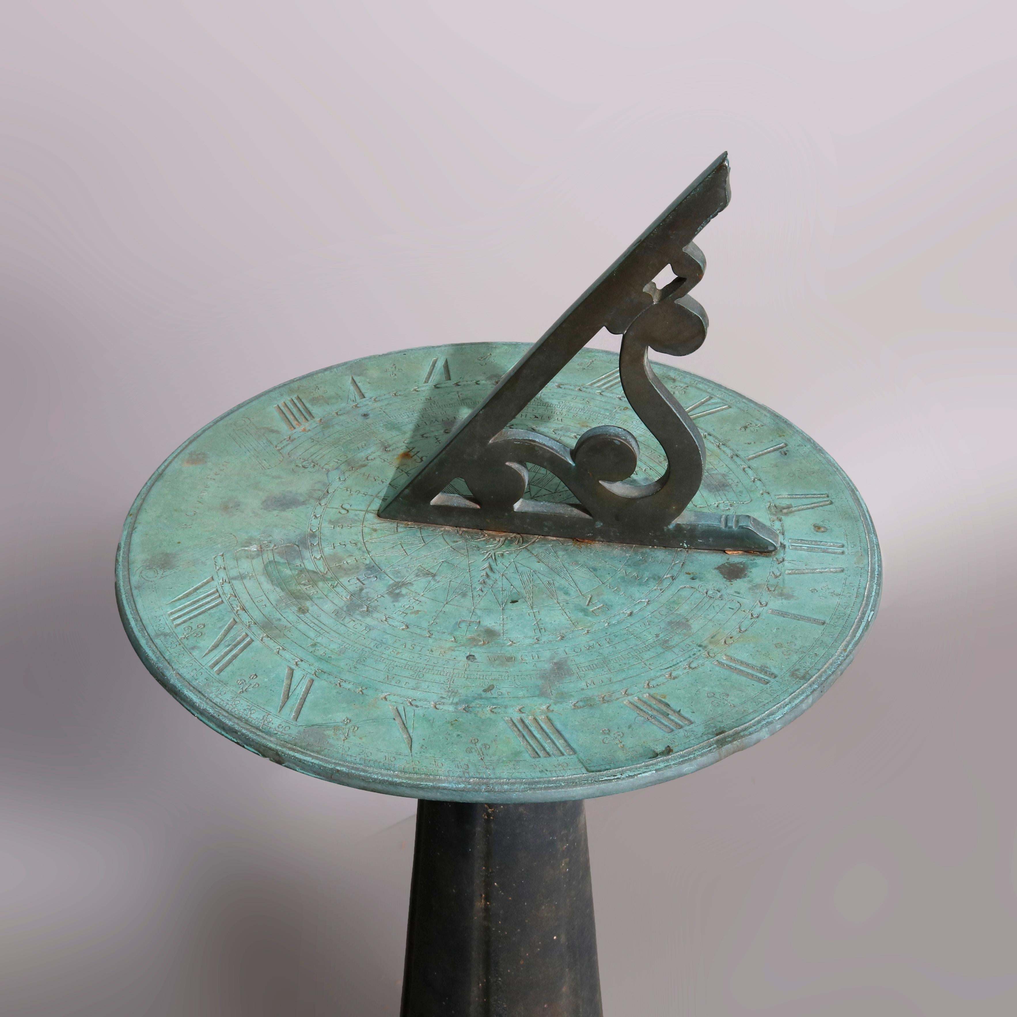 An antique English garden sun dial signed Richard Glynne offers bronze dial surmounting flared and fluted column base, signed Richard Glynne Fecit as photographed, circa 1920.

Measures: 31.5
