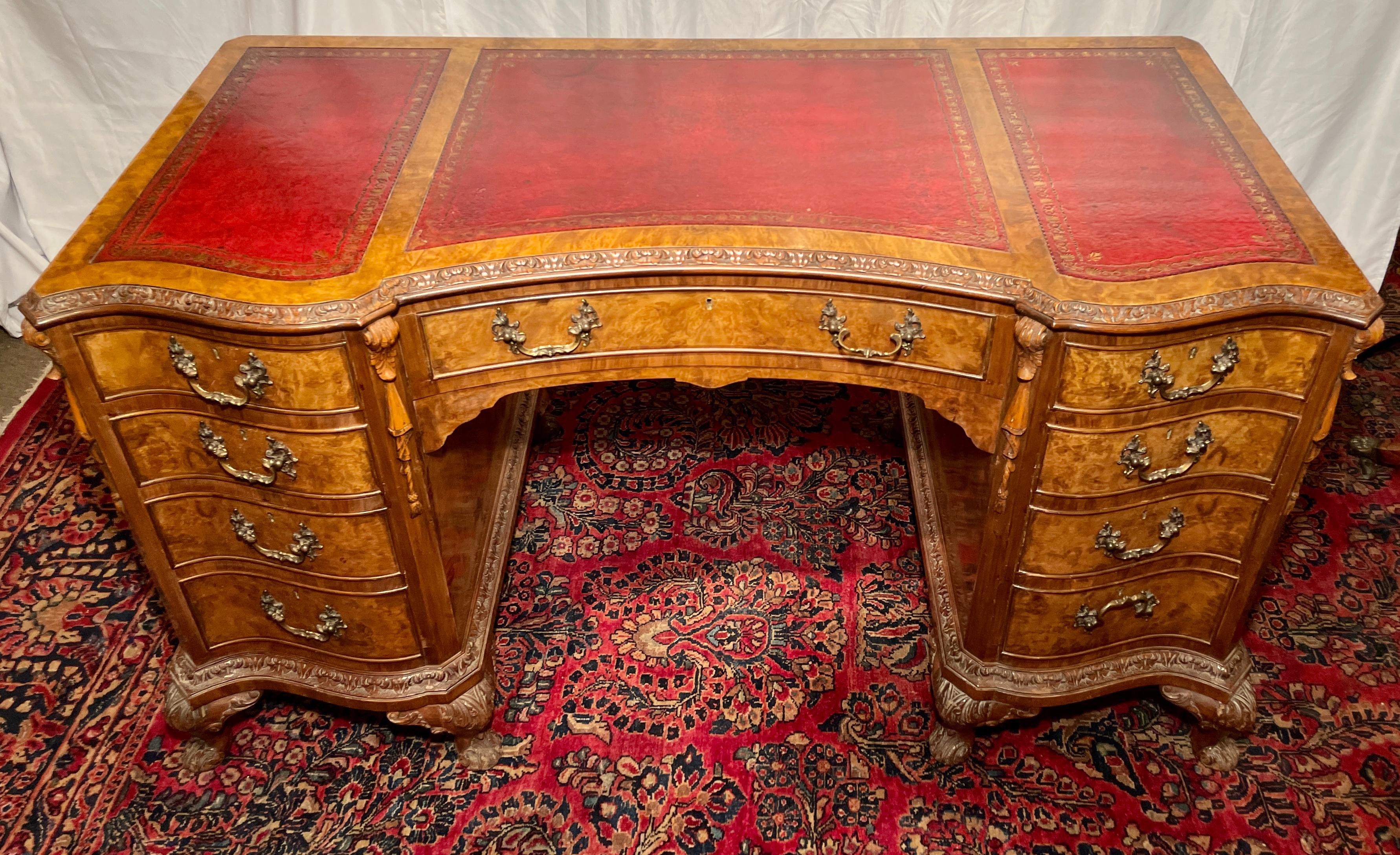 Antique English burled walnut leather top desk, circa 1880.