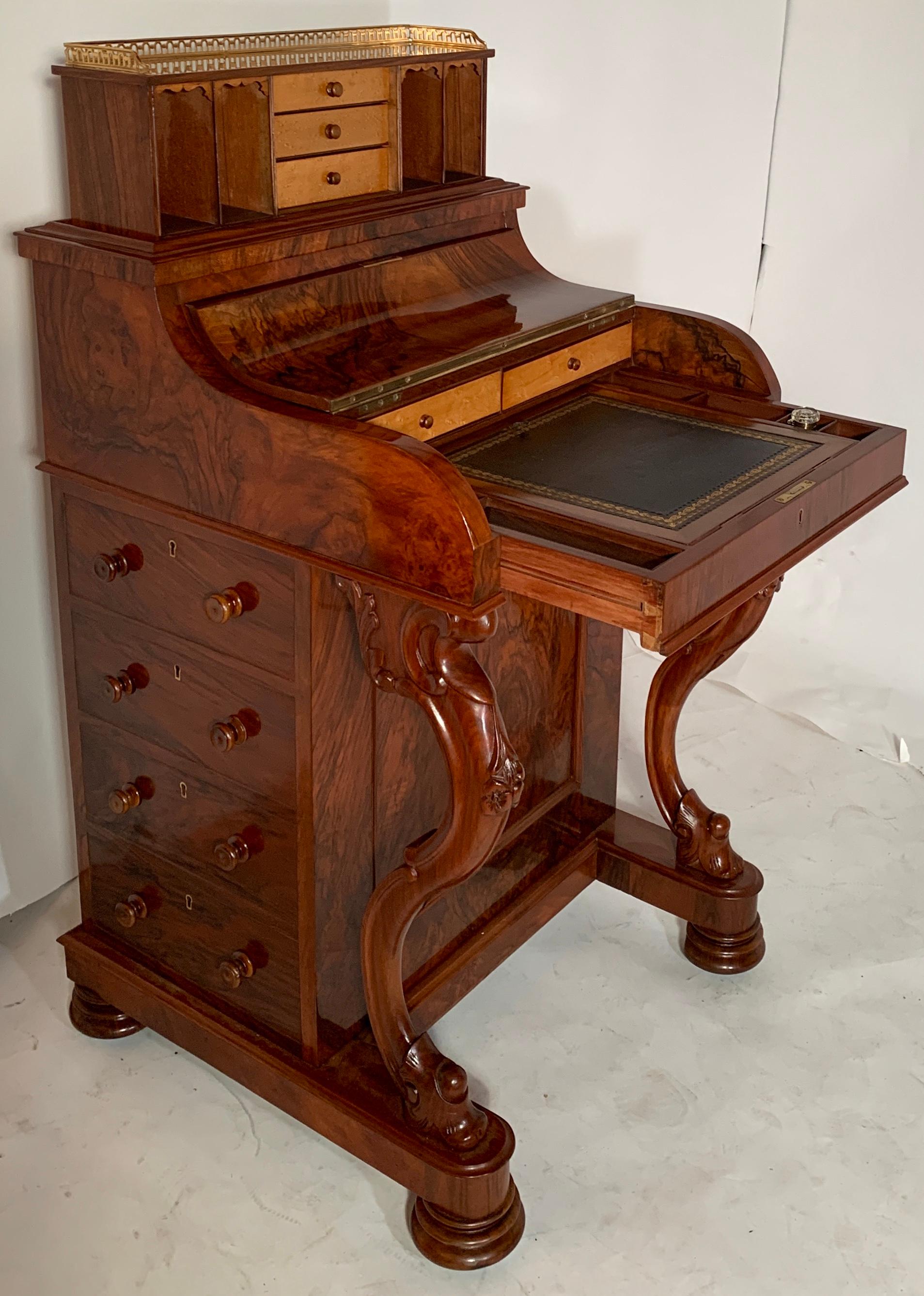 Antique English burled walnut mechanical davenport desk, circa 1870.
EWD050.