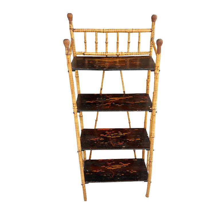 A grand millennial's dream come true! This early Victorian English burnt bamboo bookshelf will be the chicest way to add extra storage to any space. With 4 shelves, this bookcase has plenty of room for all of your favorite items. Each shelf is