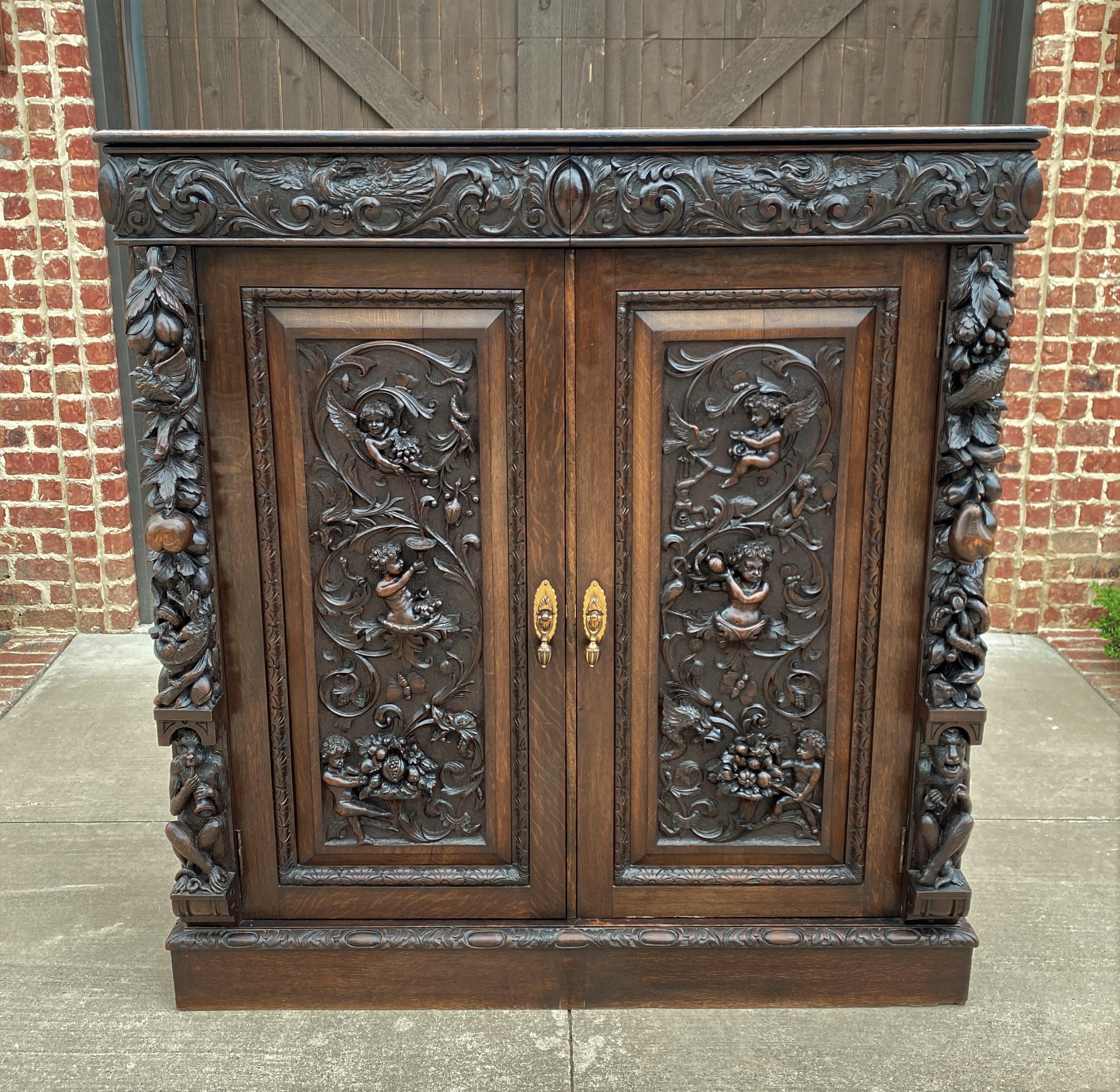 SUPERB Antique English GOTHIC REVIVAL Oak Cabinet, Chest, or Wardrobe~~ONE OF A KIND~~HIGHLY CARVED with 8 Interior Sliding Compartments ~~c. 
1880s 


 This is a MUST SEE! RARE STATEMENT PIECE~~19th century English oak cabinet with exquisitely