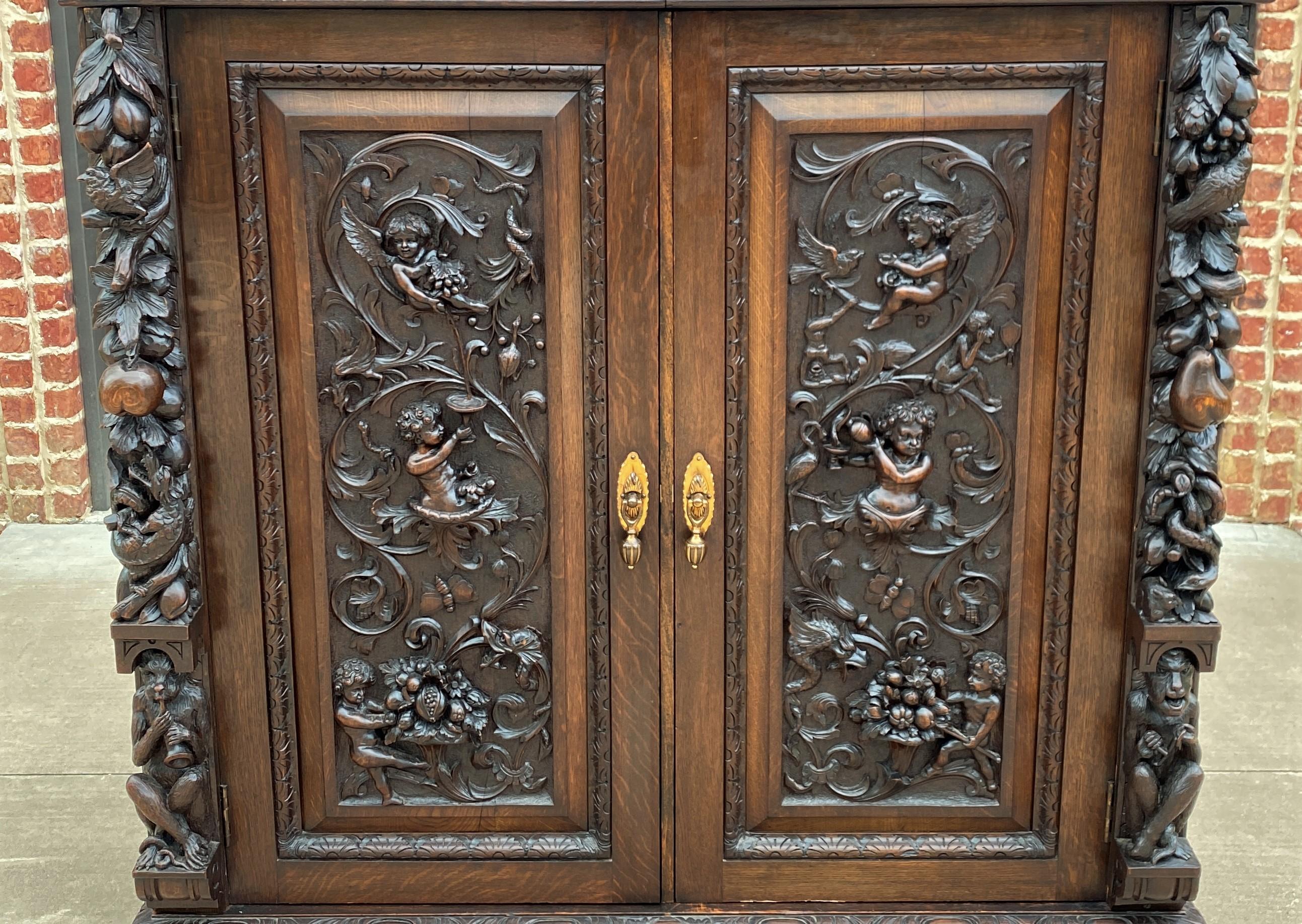 Carved Antique English Cabinet Chest Wardrobe Gothic Revival Oak Monkeys Rare c.1880s For Sale