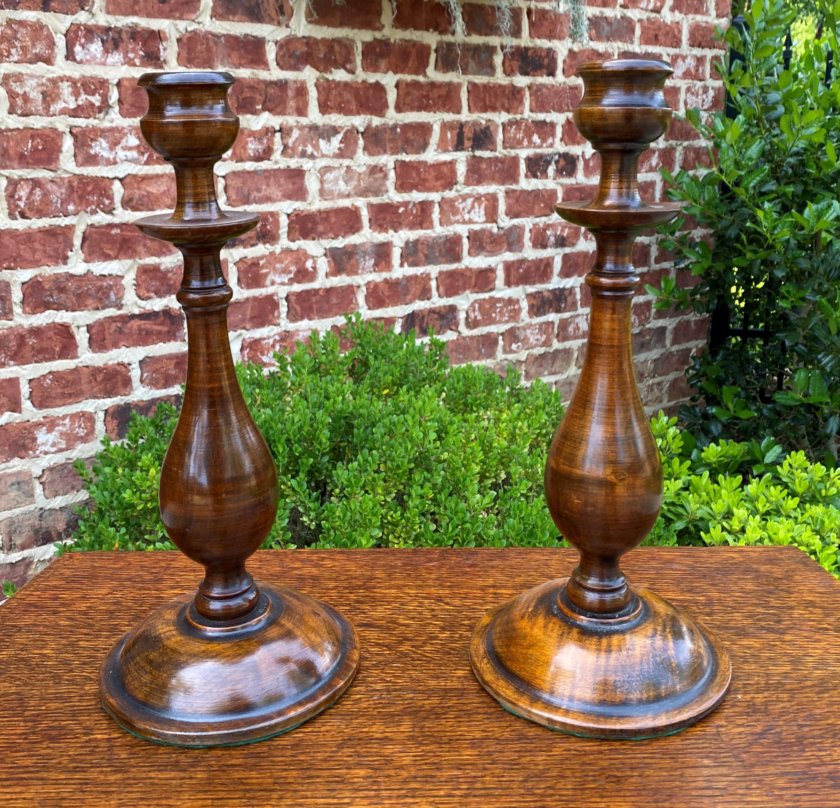 Charming pair of tall Antique English oak candlesticks candle holders c. 1930s

Sturdy and stable oak

13.5