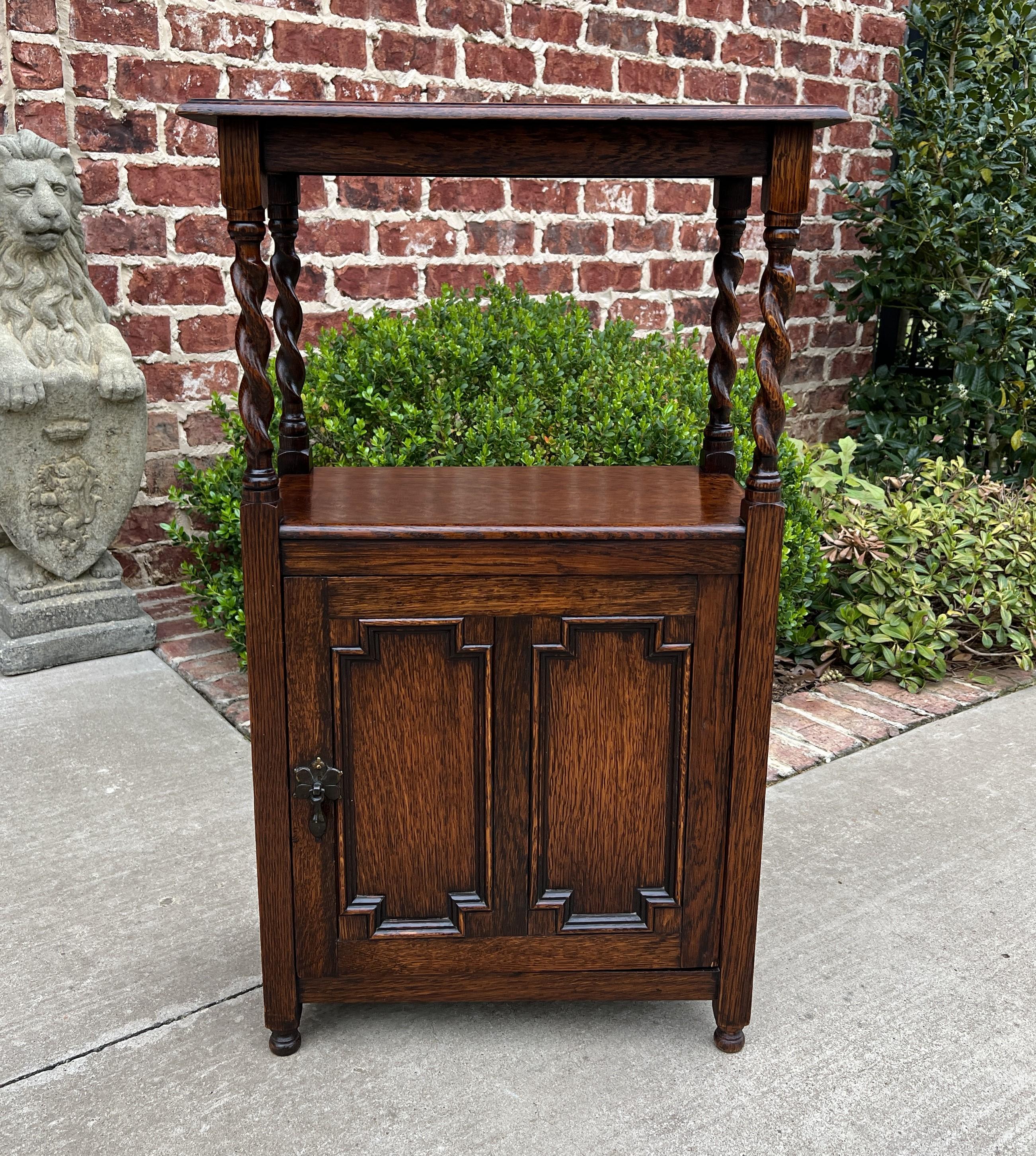 Charming and rare antique english oak barley twist end table cabinet with revolving magazine book rack~~circa 1920s.

 Versatile size~~fits in small spaces
 33.5