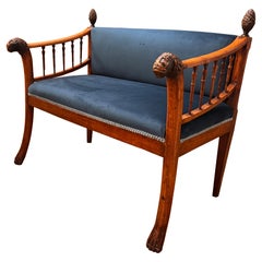 Antique English carved lion head walnut banquette