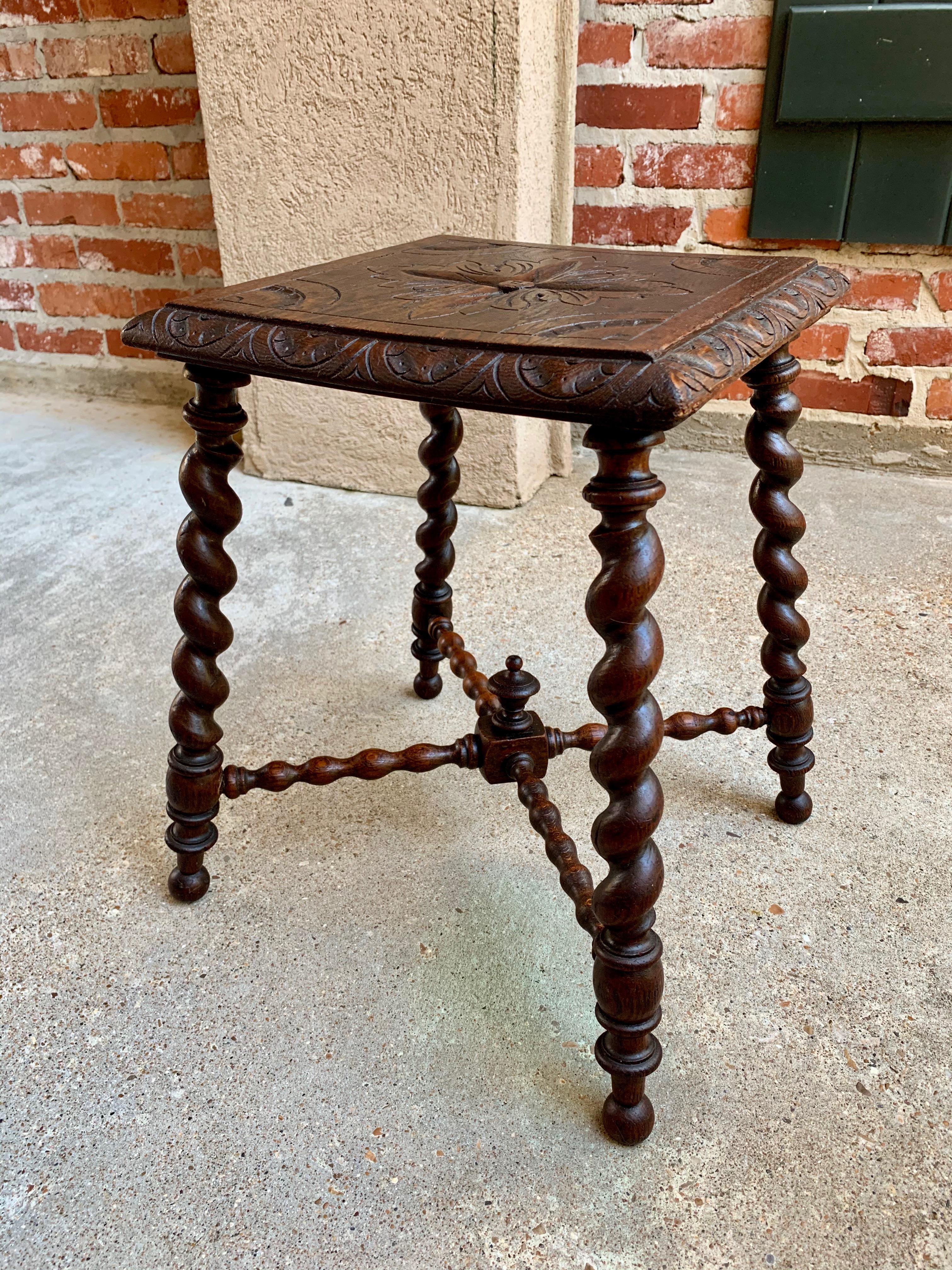 ~Direct from England~
~A beautiful antique English carved barley twist stool!~
~Tall and lovely, with splayed barley twist legs, loaded with quality craftsmanship from it’s ornately carved solid oak top (with carved beveled edges) all the way to